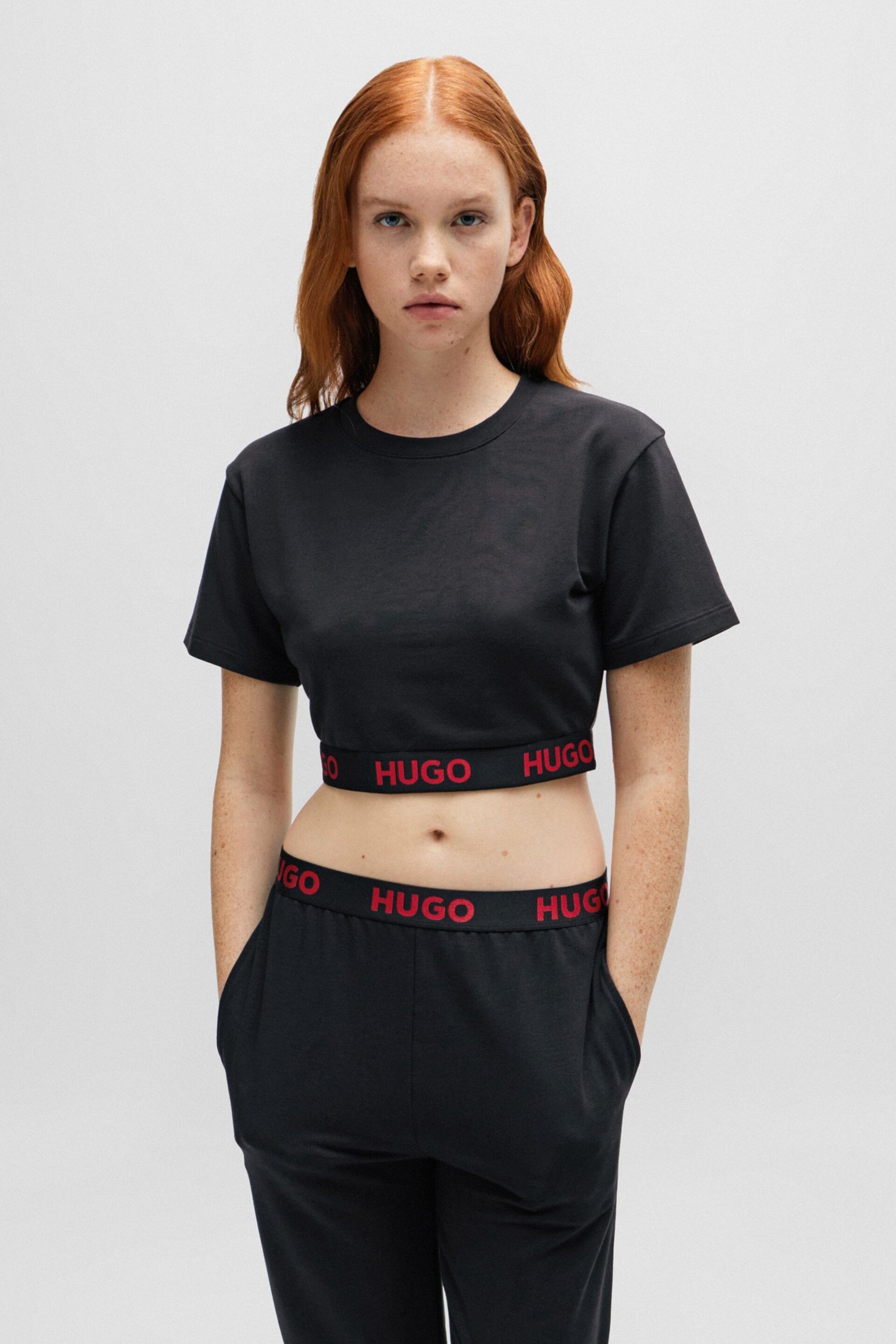 HUGO Cropped Black T-Shirt in Stretch Fabric With Logo Waistband Crop Top - Image 2 of 6