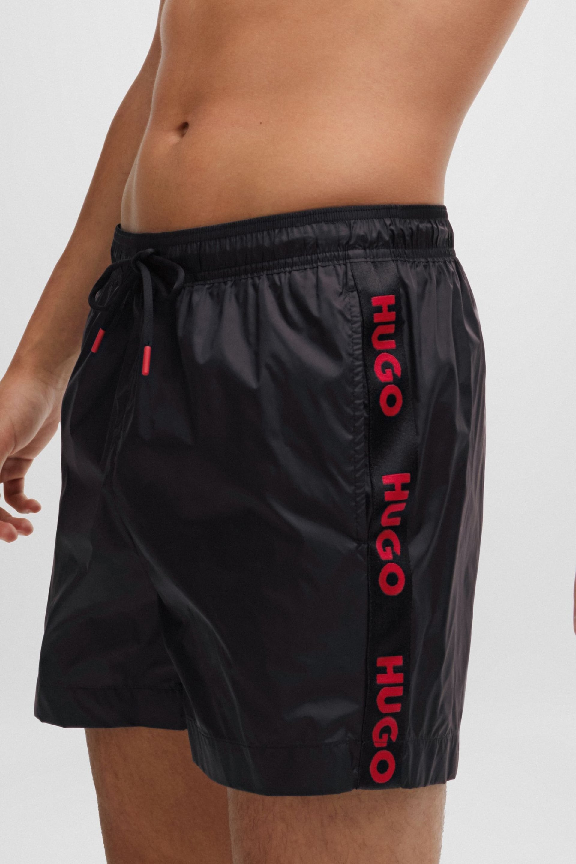 HUGO Logo Tape Swim Black Shorts In Quick Drying Fabric - Image 3 of 4