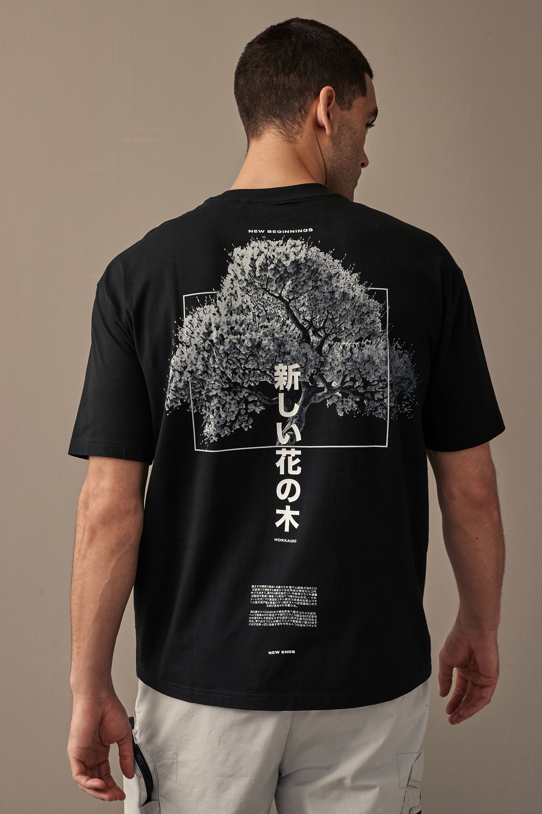 Grey t shirt with black print online