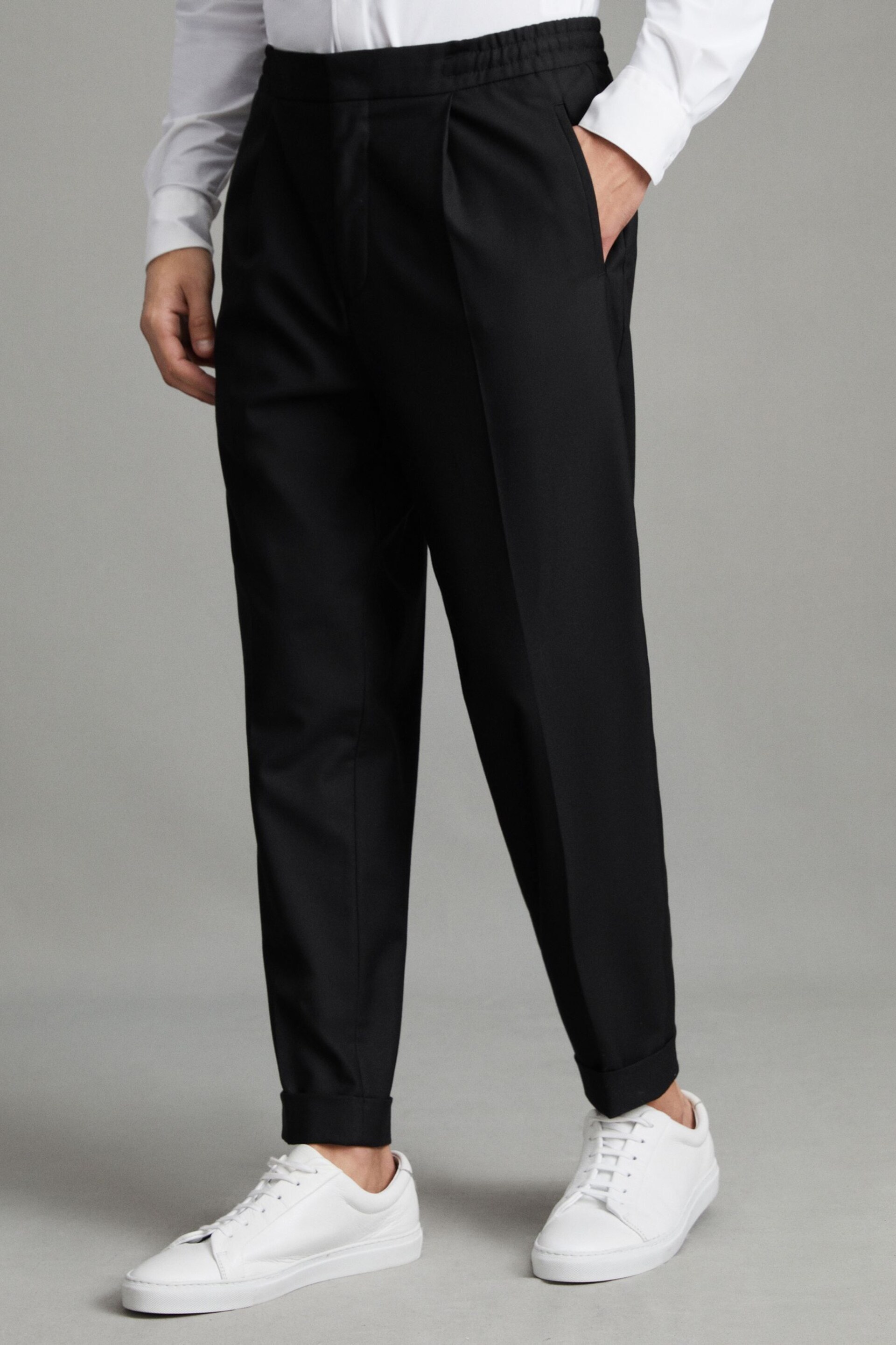 Reiss Black Brighton Relaxed Drawstring Trousers with Turn-Ups - Image 1 of 6