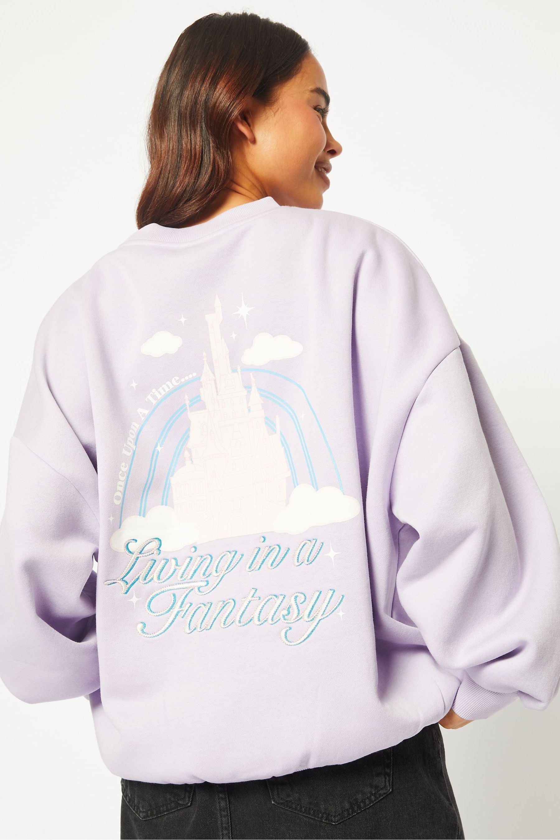 Buy Skinnydip Purple Disney Living In A Fantasy Sweatshirt from Next Luxembourg