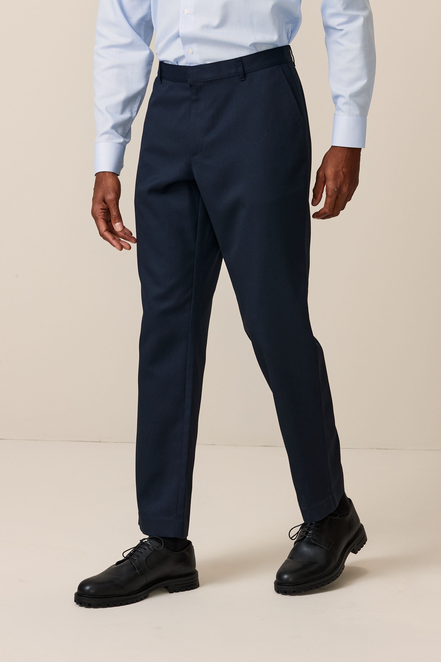 Buy Navy Blue Regular Fit Plain Front Smart Trousers from the Next UK online shop