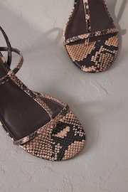 Snake Print Signature Leather Toe Post Heeled Sandals - Image 10 of 11