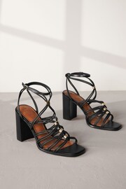 Black Signature Leather Hardware Detail Block Heel Sandals - Image 1 of 6