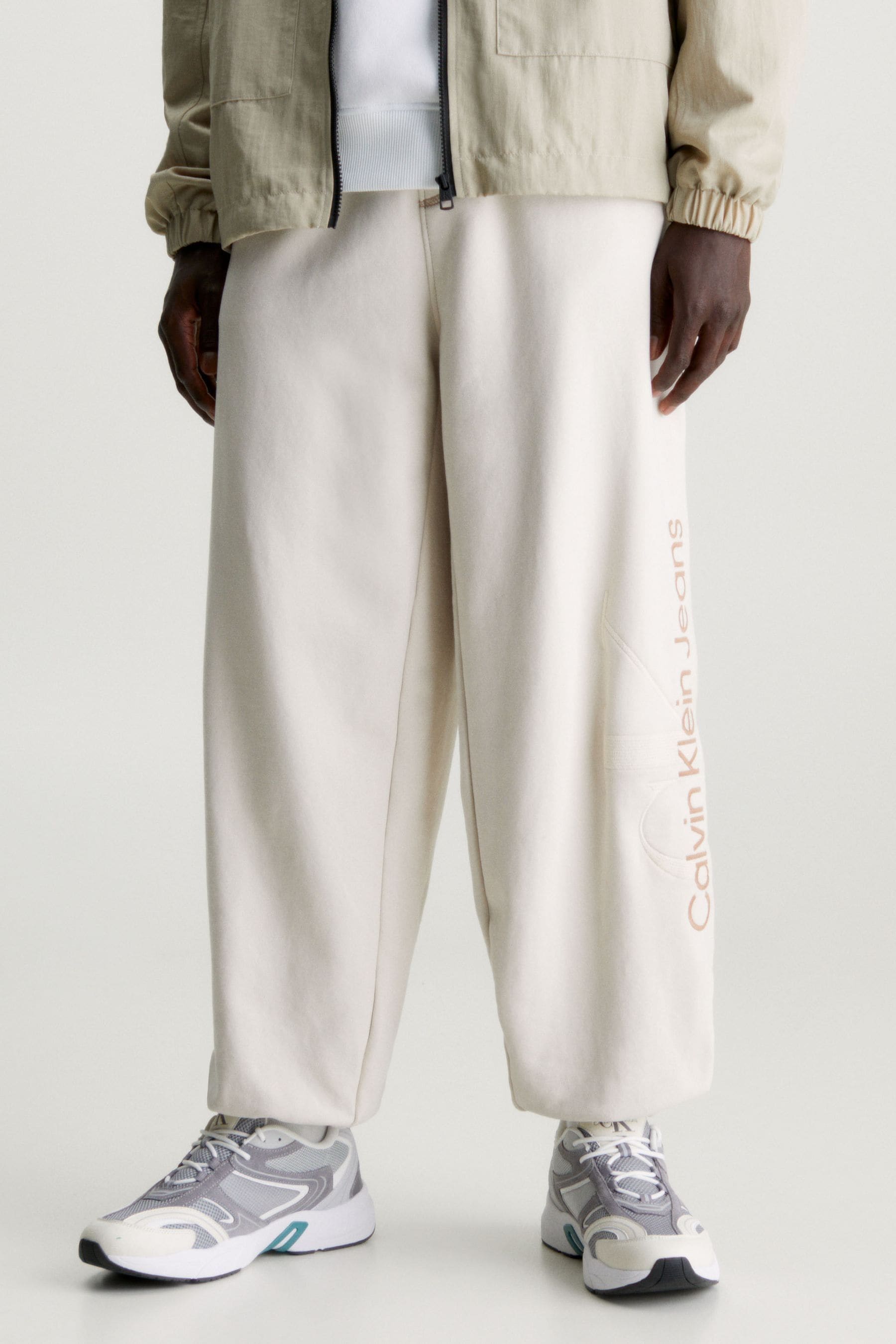 Buy Calvin Klein Jeans Cream Wash Monologo 100 Cotton Joggers from Next Luxembourg