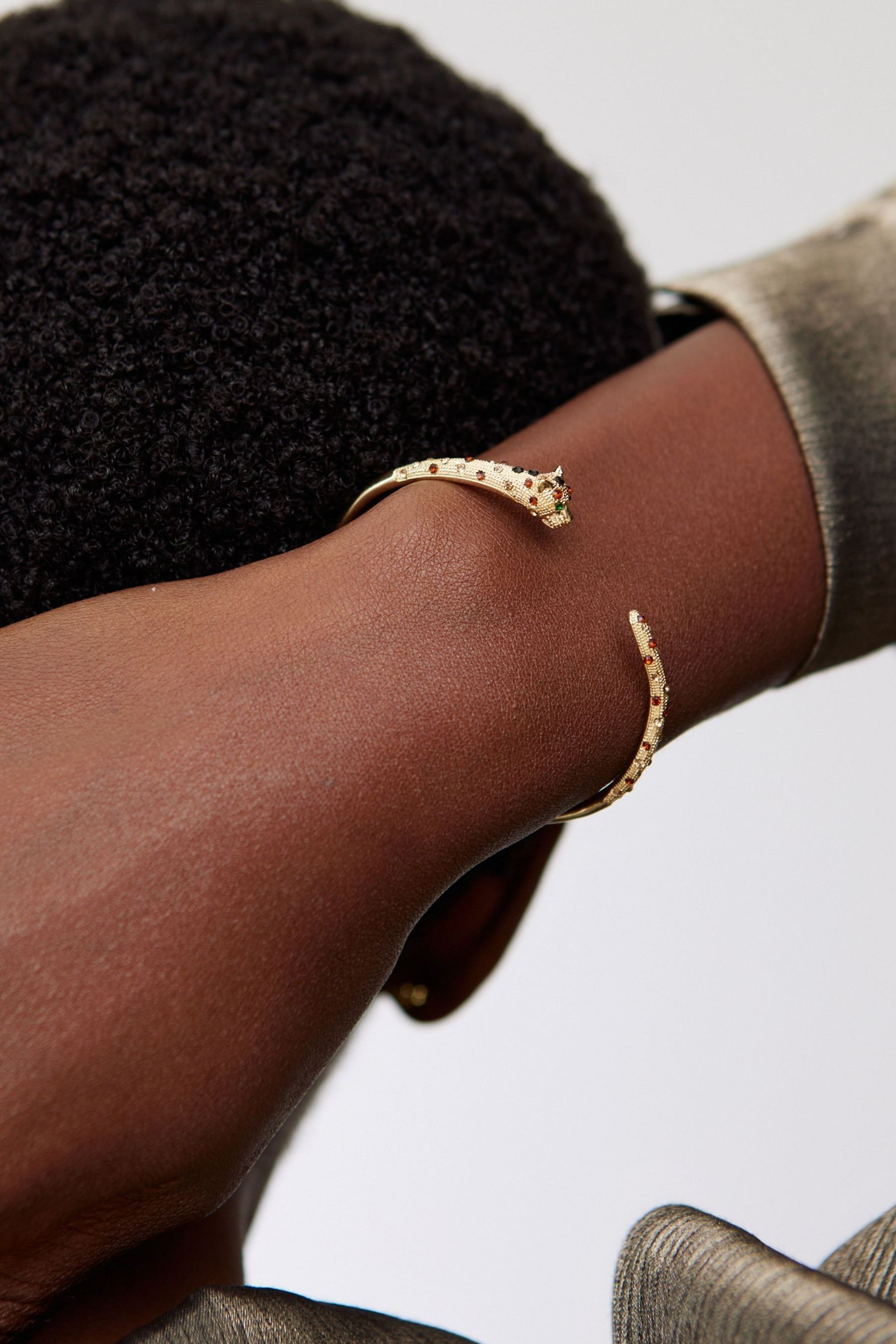 Buy Oliver Bonas Gold Tone Adrienne Cheetah Glass Stone Bangle from the Next UK online shop
