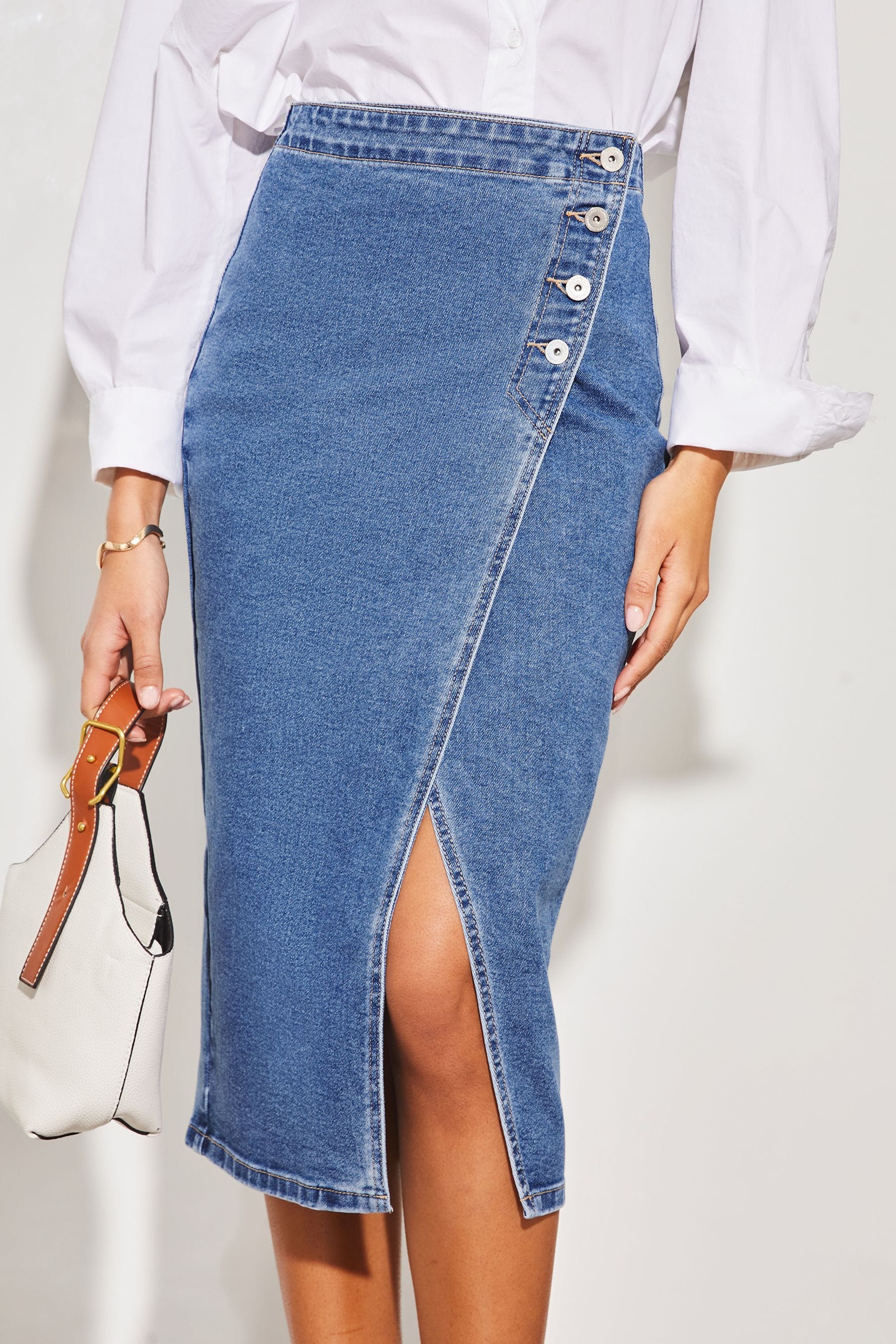 Asymmetrical skirt button discount