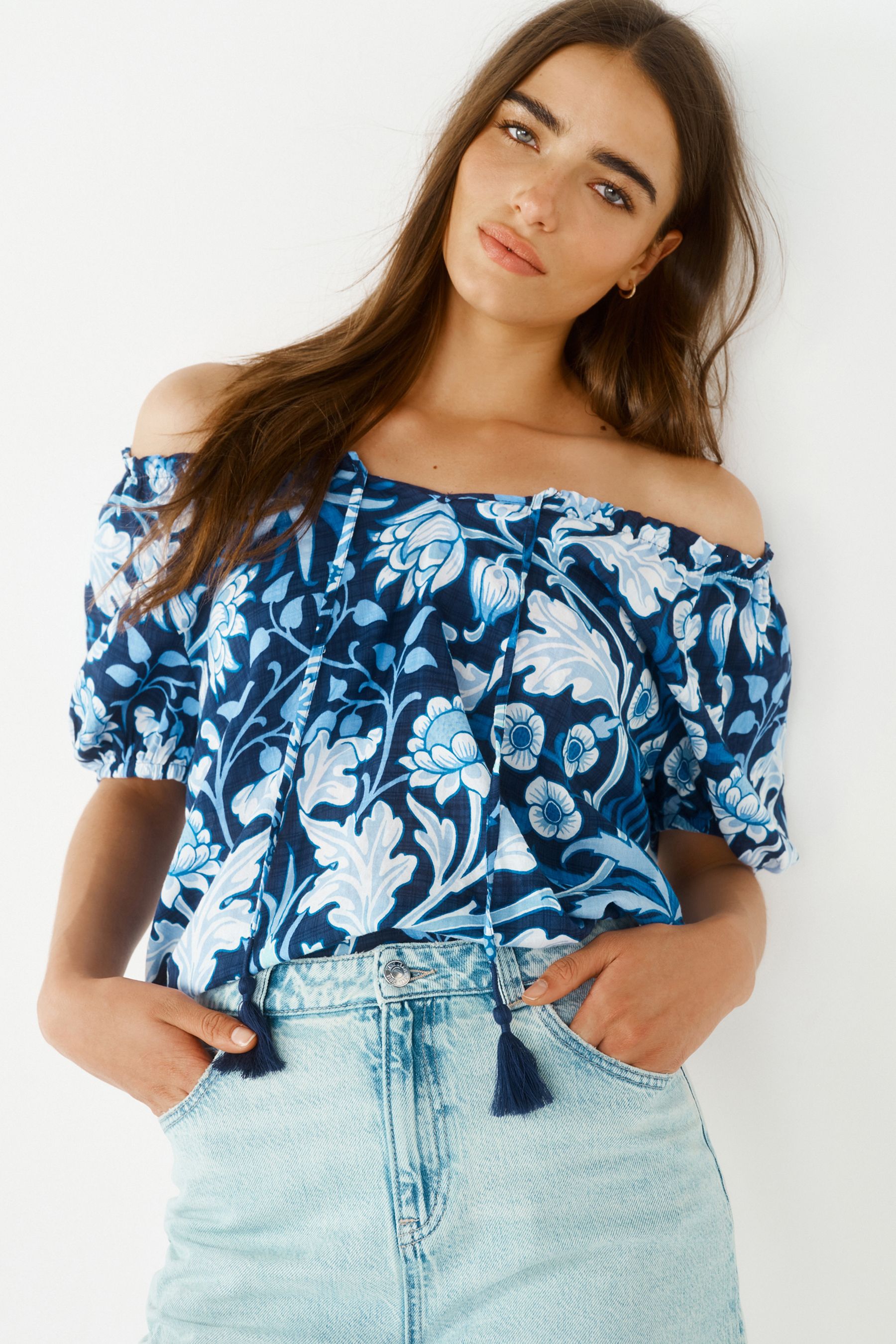 Buy Morris Co. Hyacinth Navy Floral Short Sleeve Tie Neck Bardot Blouse from the Next UK online shop