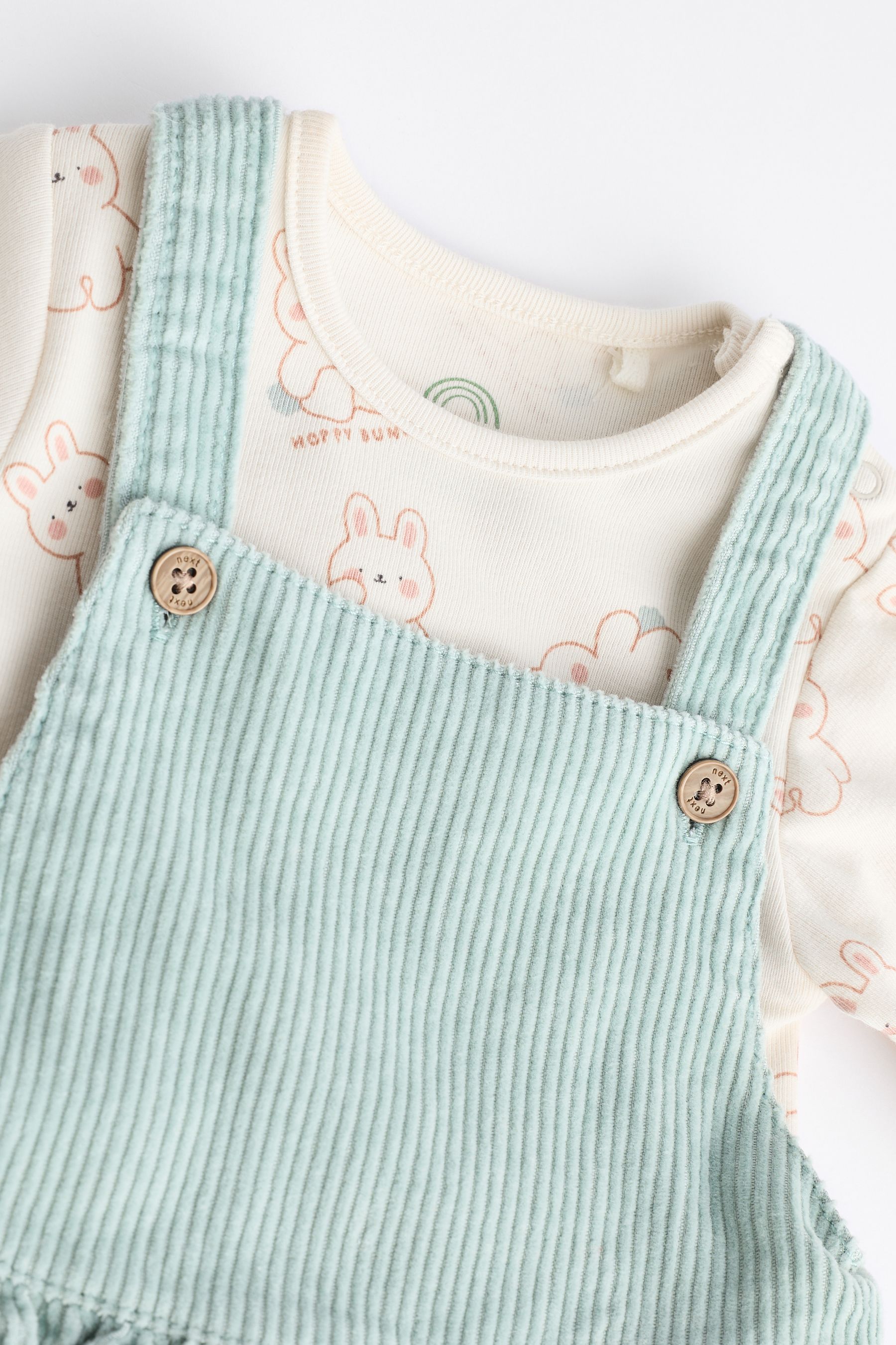 Next pinafore dress baby discount