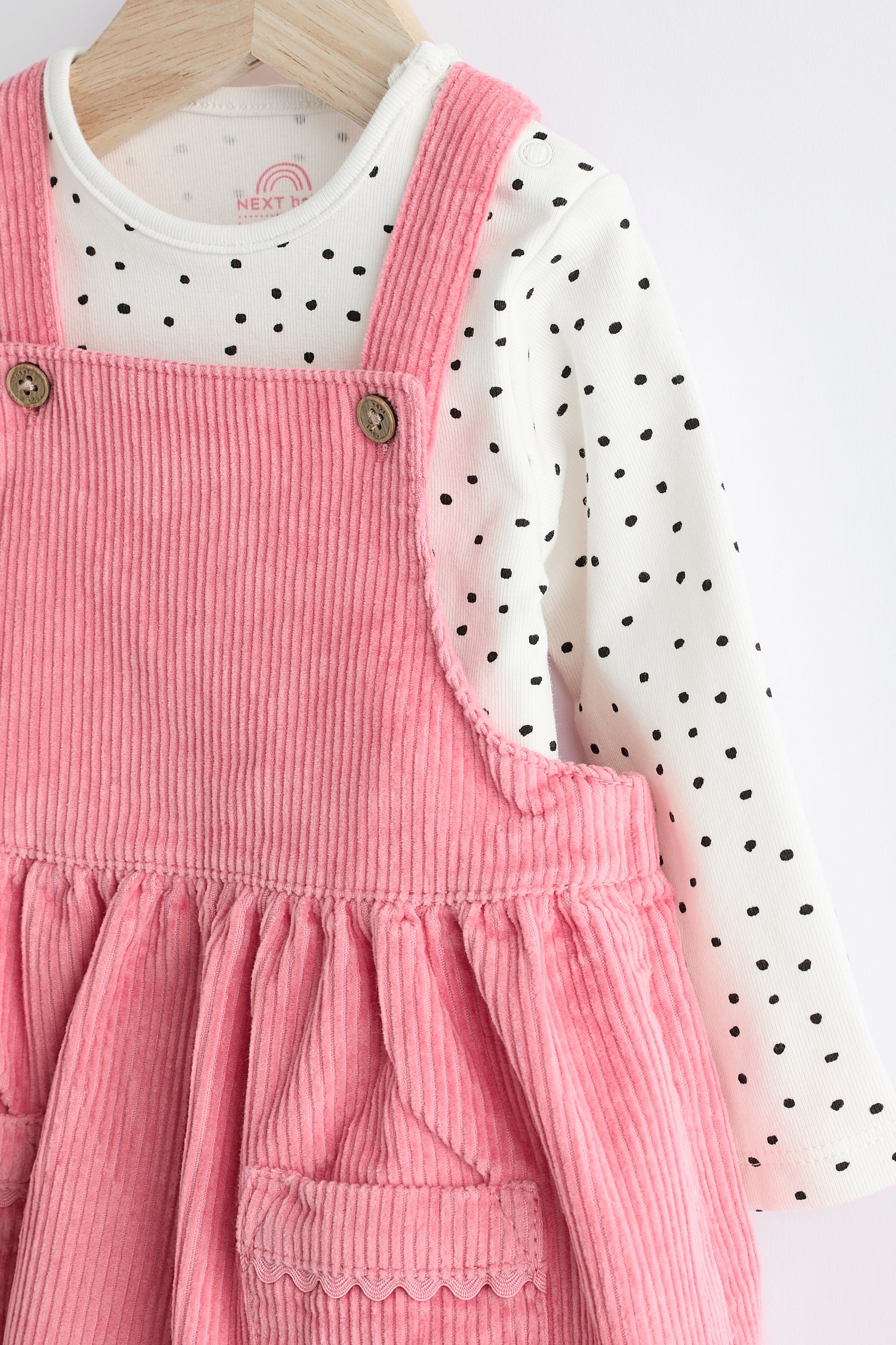 Buy Bright Pink Corduroy Baby Pinafore Dress 0mths 2yrs from the Next UK online shop