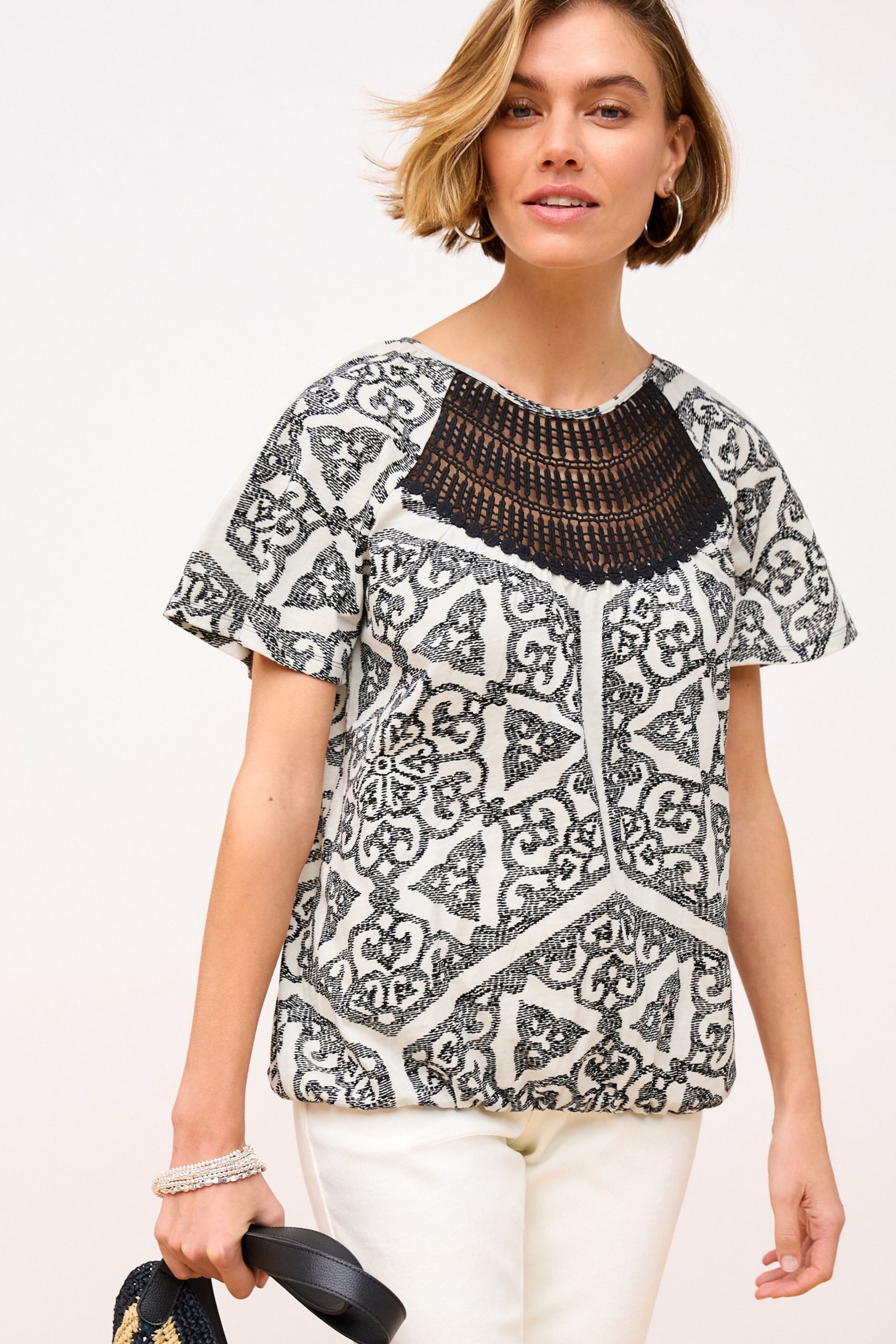 Black/White Print Short Sleeve Crochet Bubblehem Top - Image 1 of 6