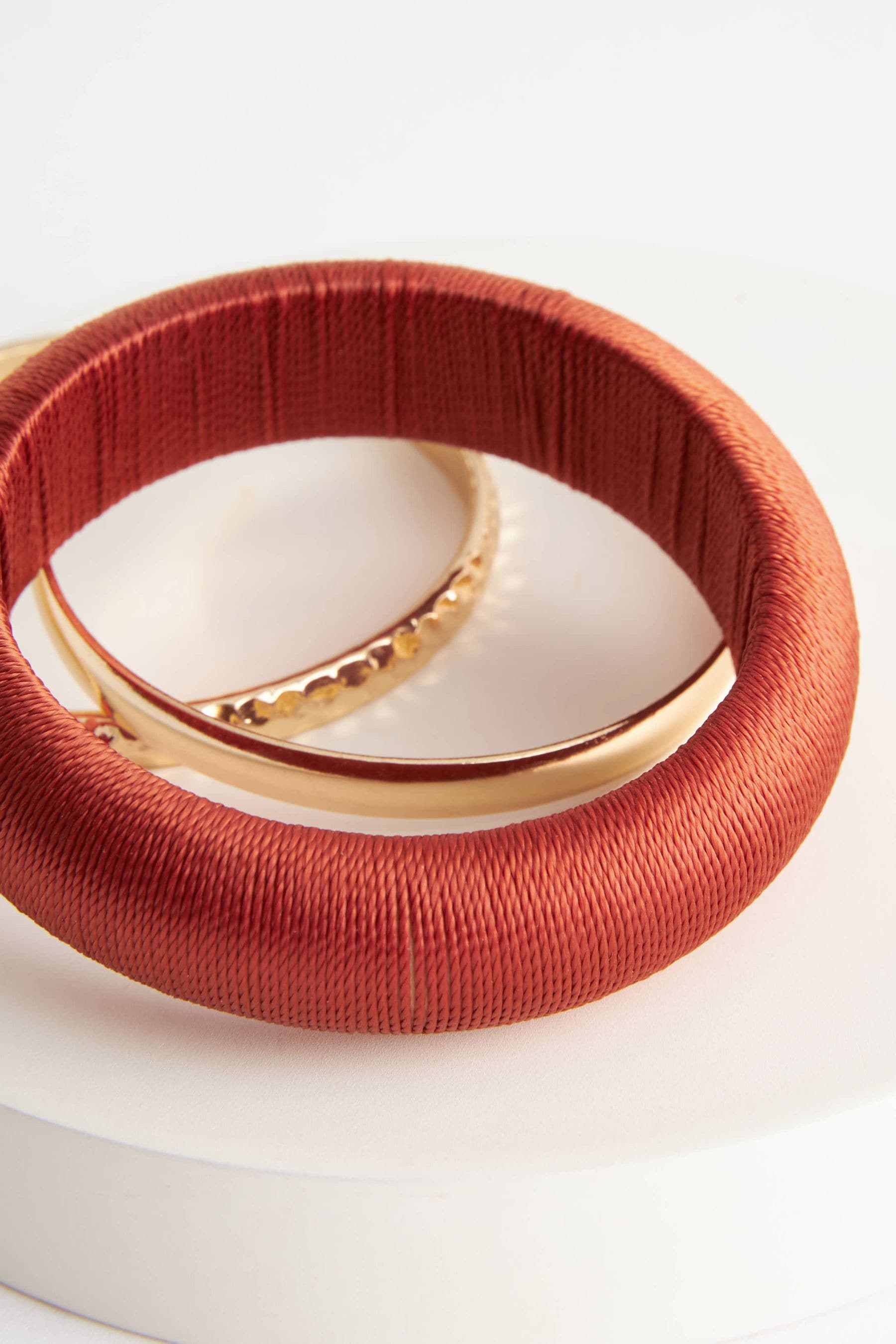 Buy Orange Thread Wrapped Chunky Bangles Pack from Next Luxembourg