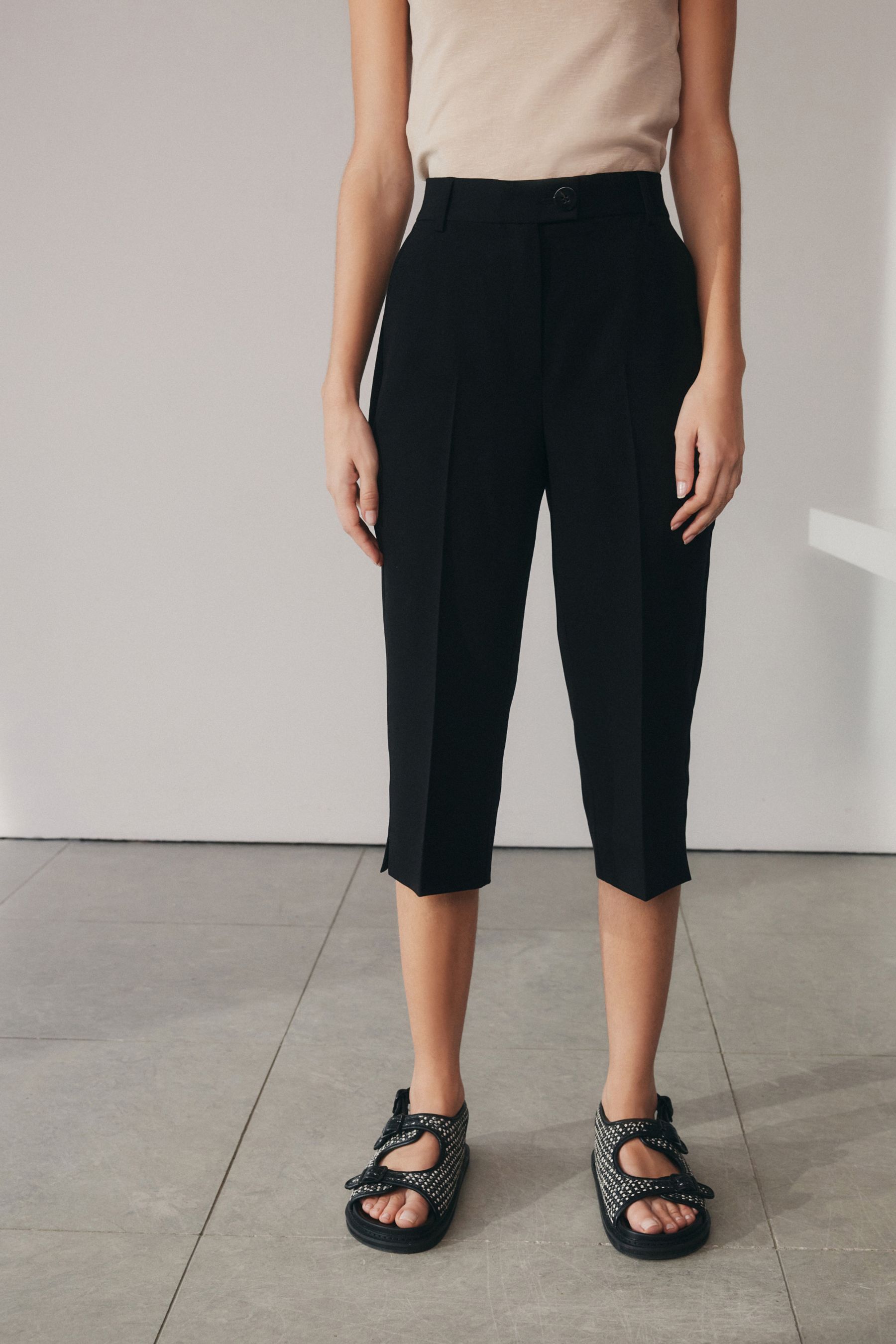 Buy Black Cropped Capri Trousers from Next Canada