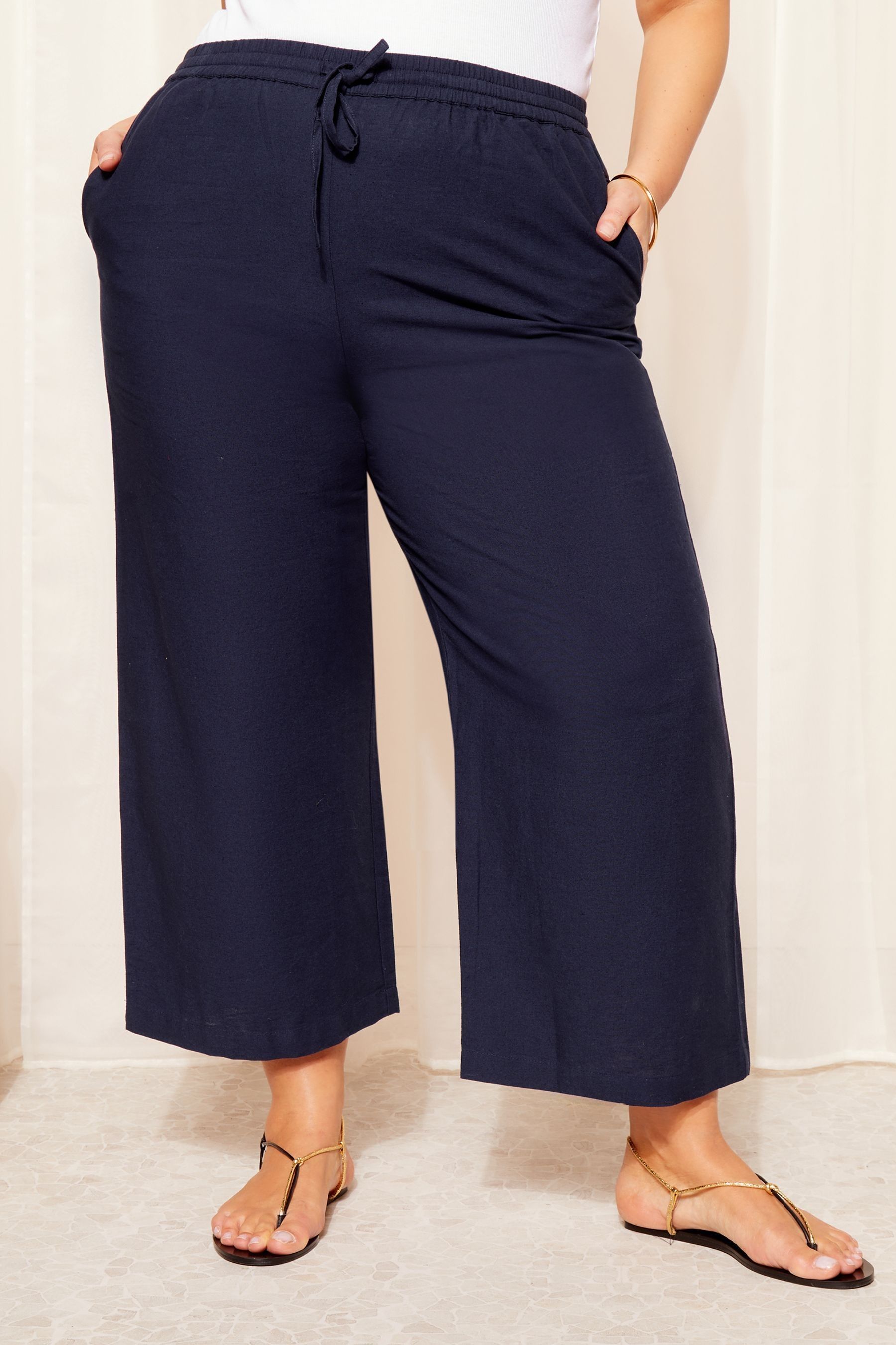 Buy Curves Like These Navy Blue Cotton Linen Mix Wide Leg Crop Trousers from Next Luxembourg