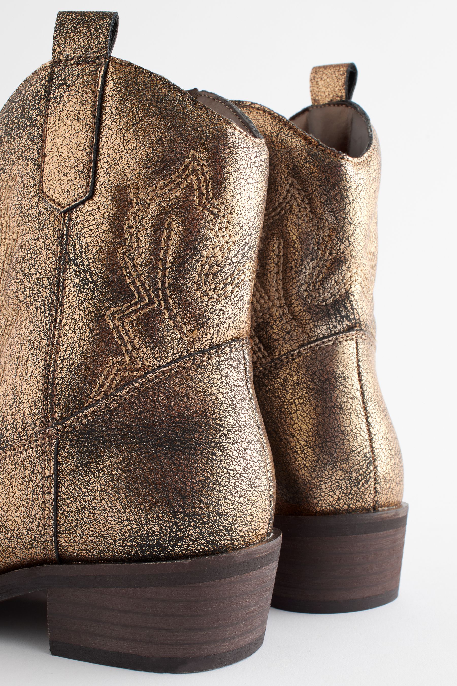 Short gold boots hotsell
