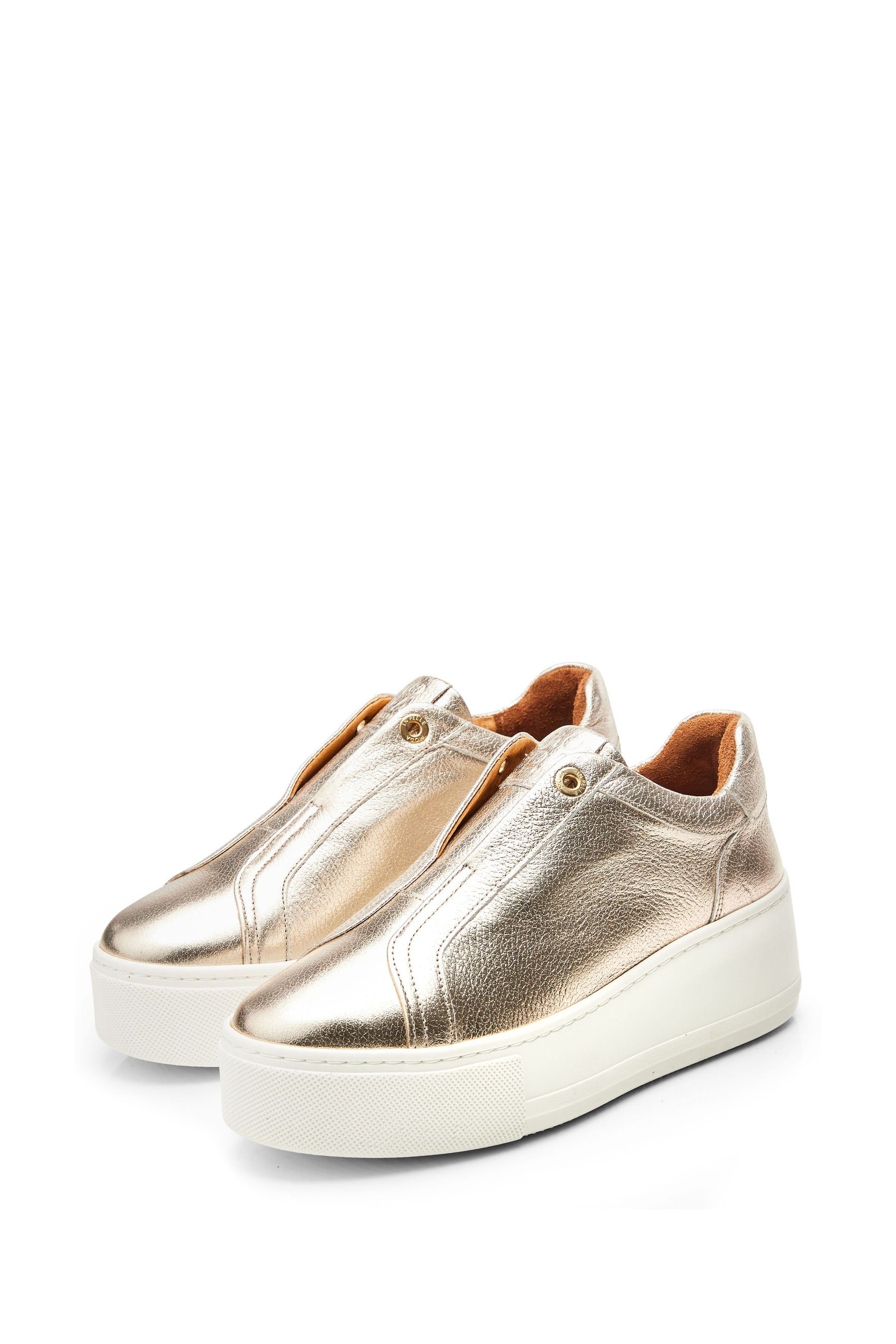 Gold wedge trainers discount