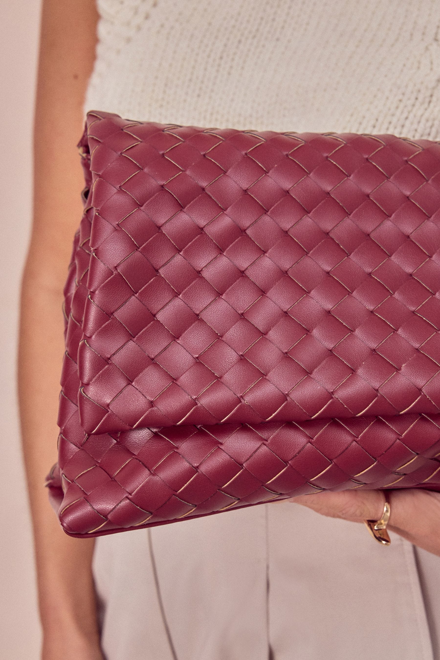 Red clutch bag next store