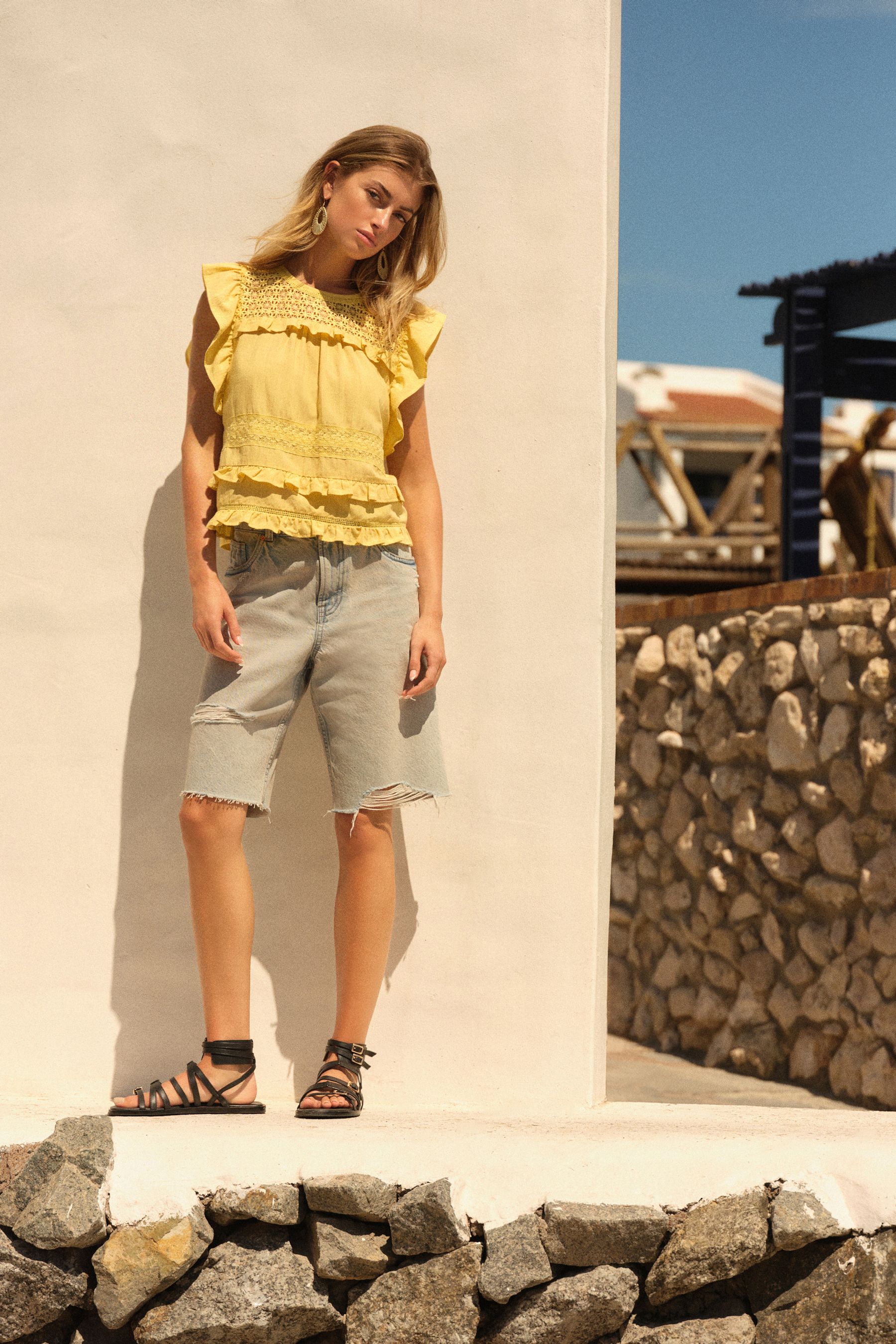 Ripped bermuda shorts best sale