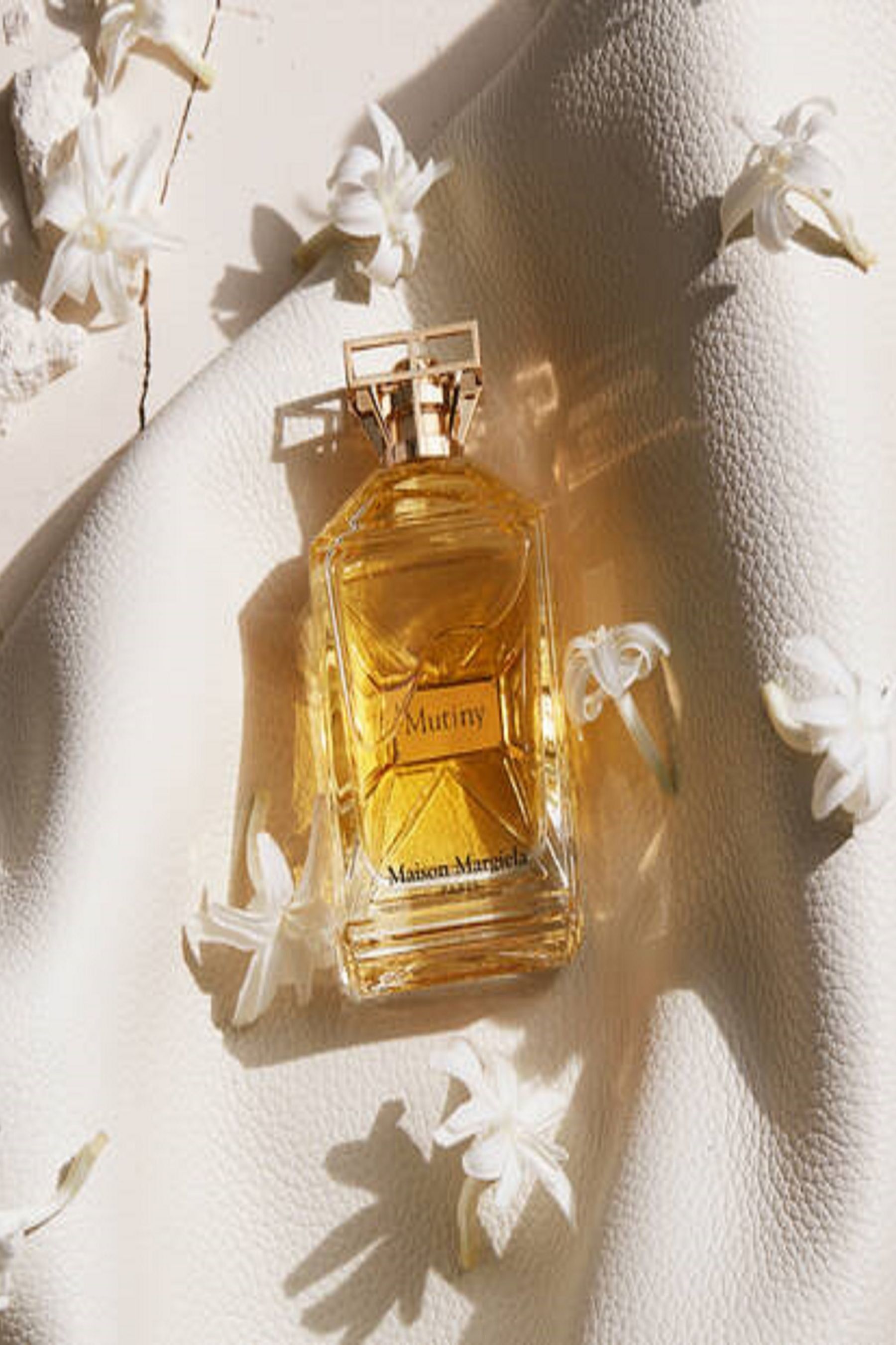 Buy Maison Margiela Mutiny Eau de Parfum 90ml from the AspennigeriaShops online shop