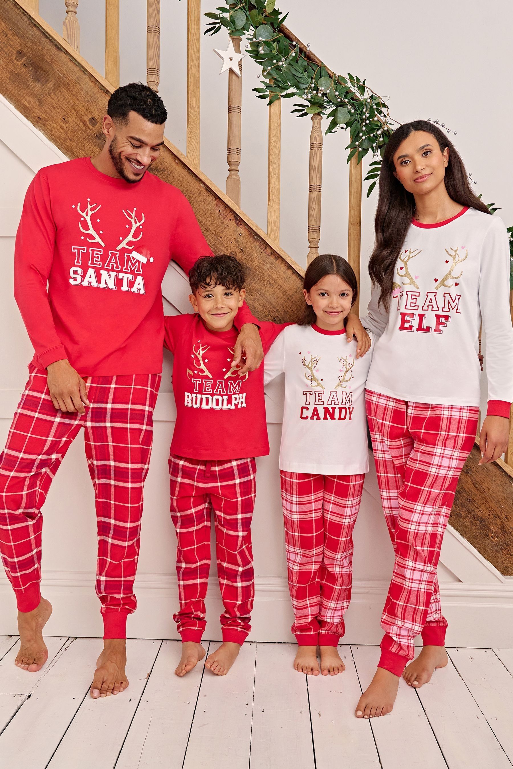 Buy Society 8 Red Reindeer Team Matching Family Christmas PJ Set from Next Luxembourg