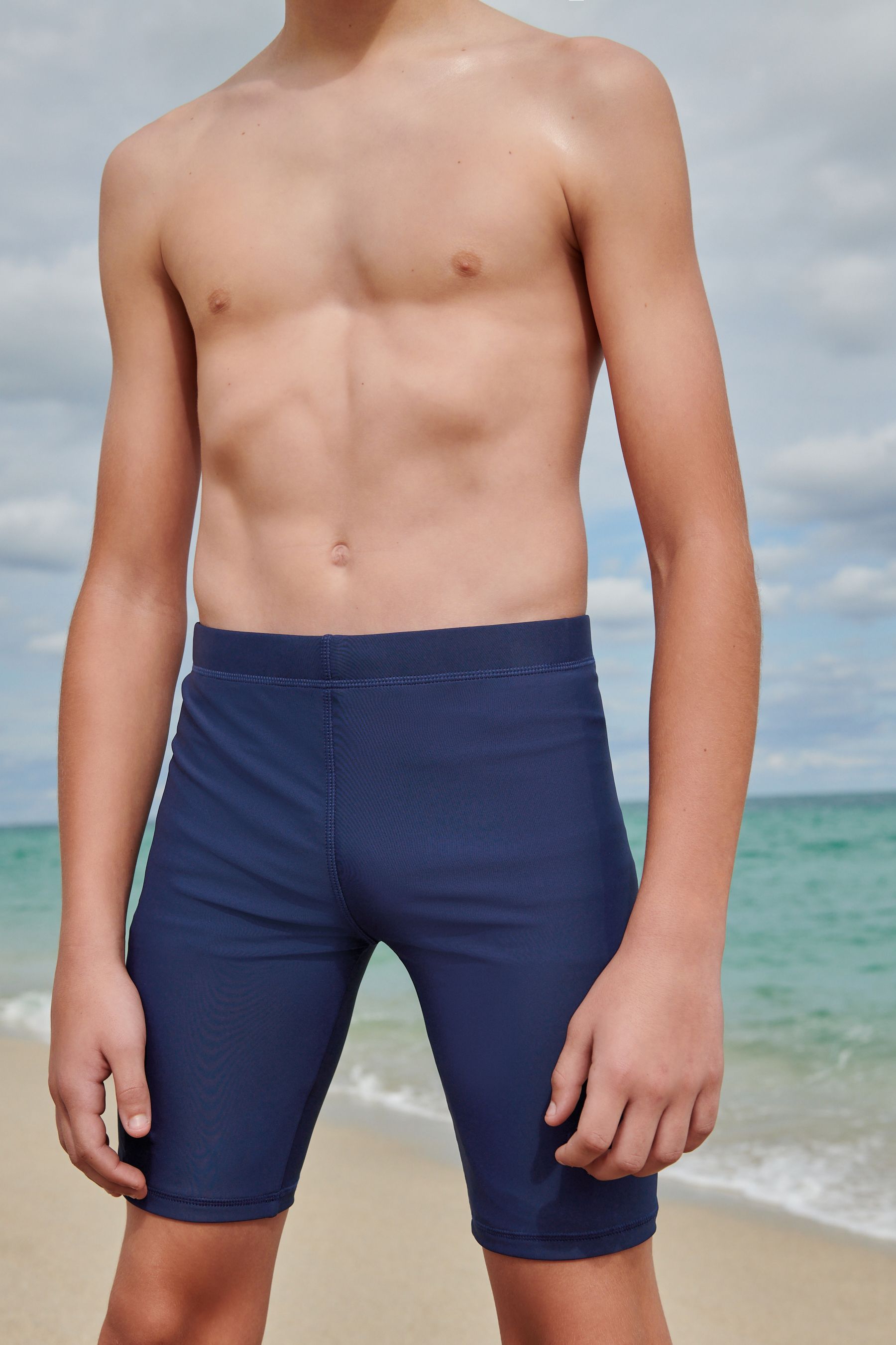 Buy Navy Blue Longer Length Stretch Swim Shorts 3 16yrs from Next Oman