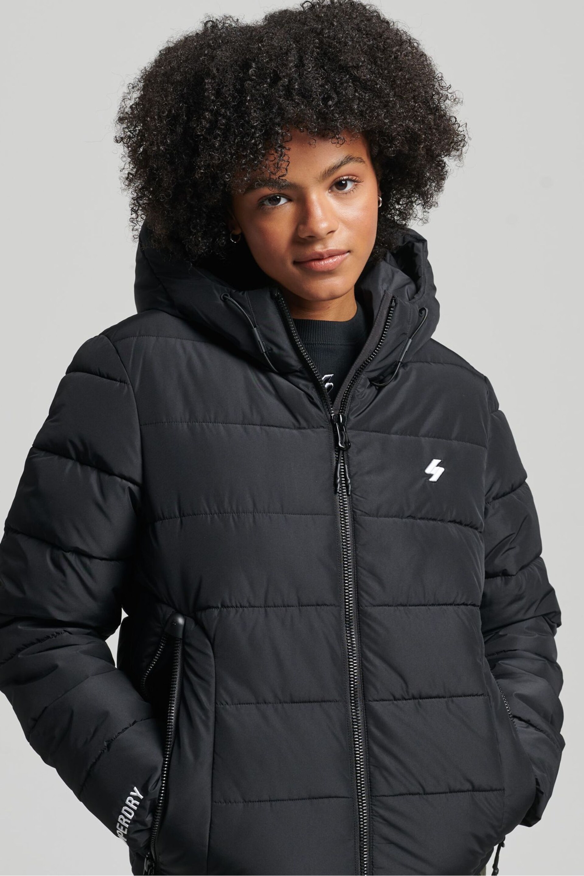 Superdry Black Hooded Spirit Sports Padded Coat - Image 1 of 9