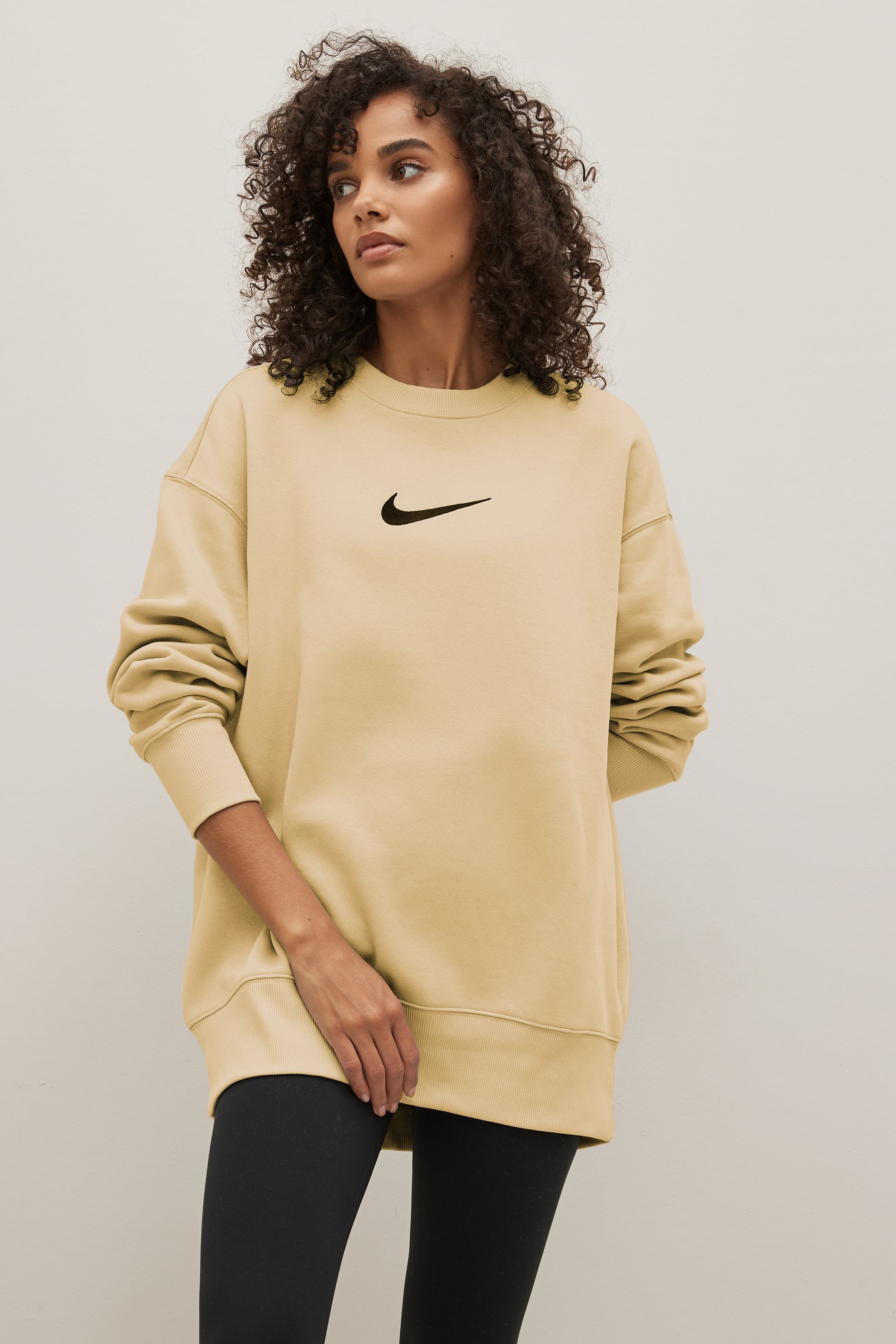 Buy Nike Cream Oversized Midi Swoosh Crew Sweatshirt from Next Luxembourg