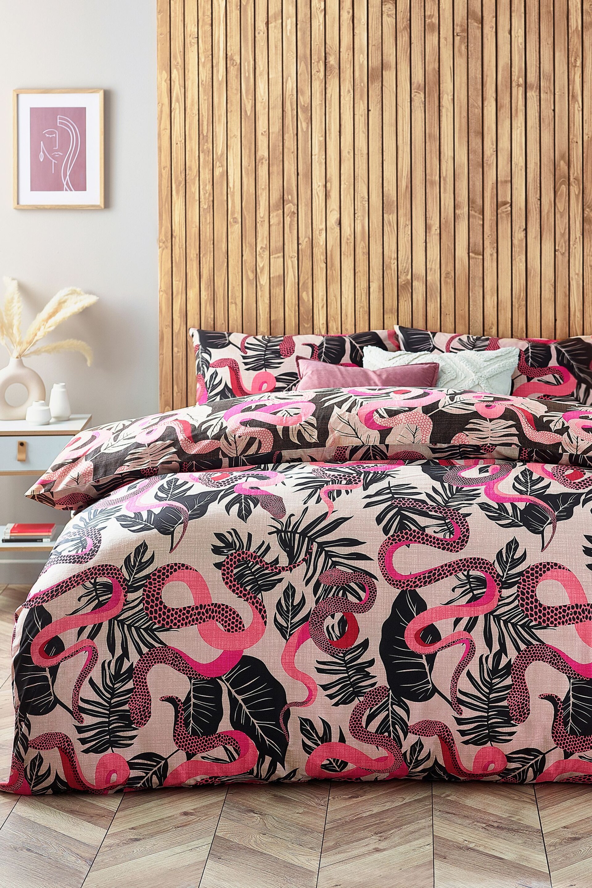 furn. Ruby Pink Serpentine Tropical Reversible Duvet Cover and Pillowcase Set - Image 1 of 3