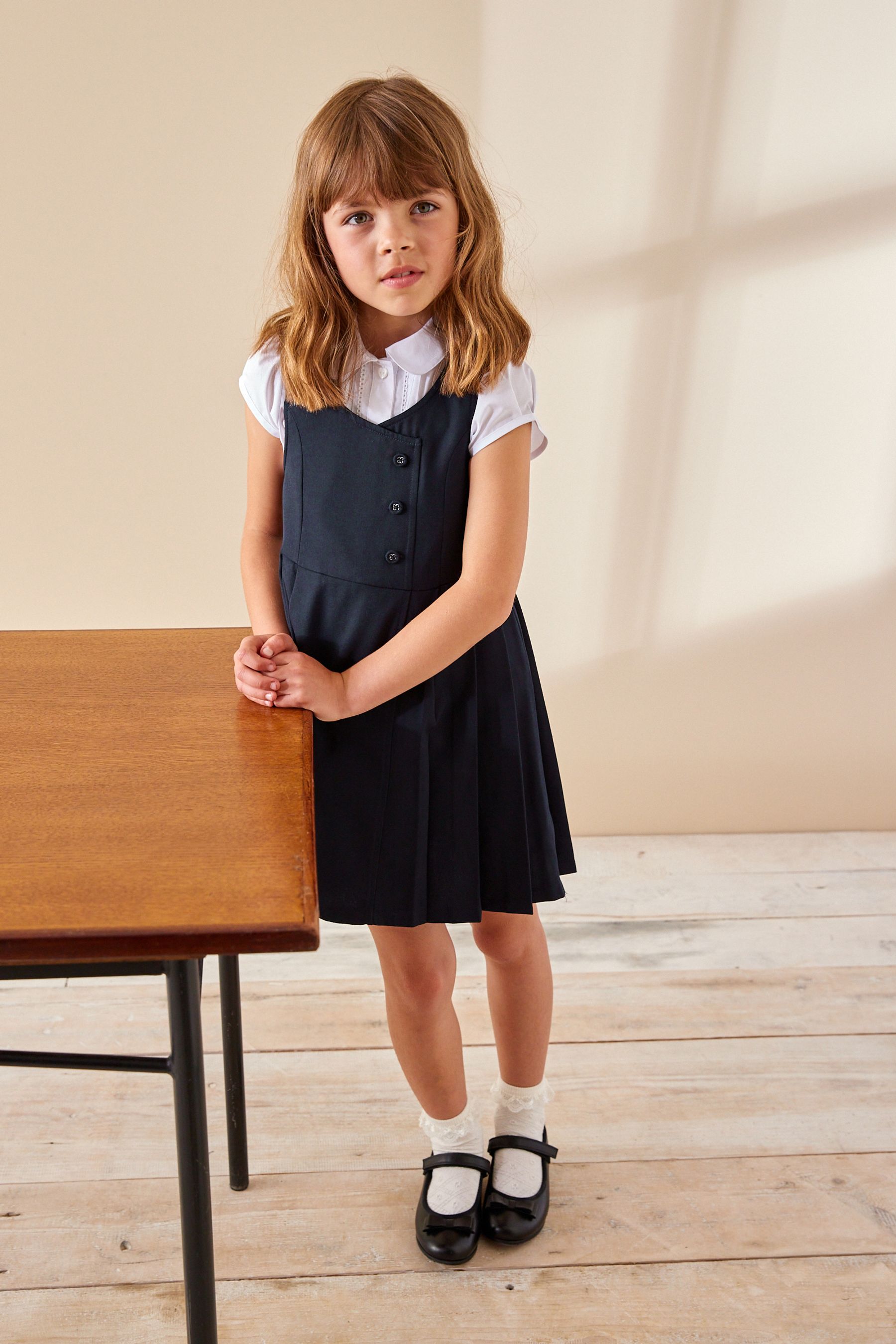 Dark blue pinafore dress sale