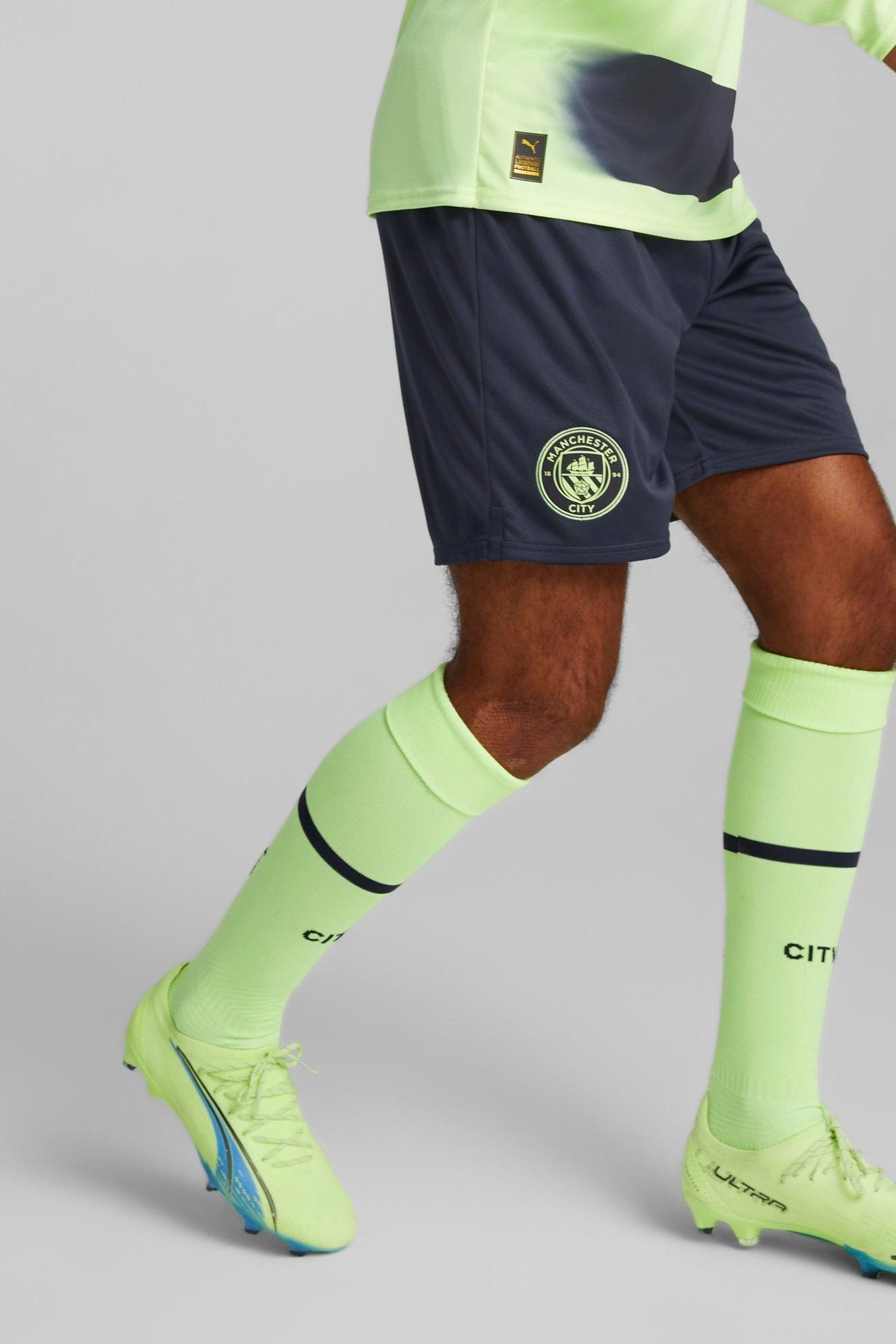 Blue puma football shorts online