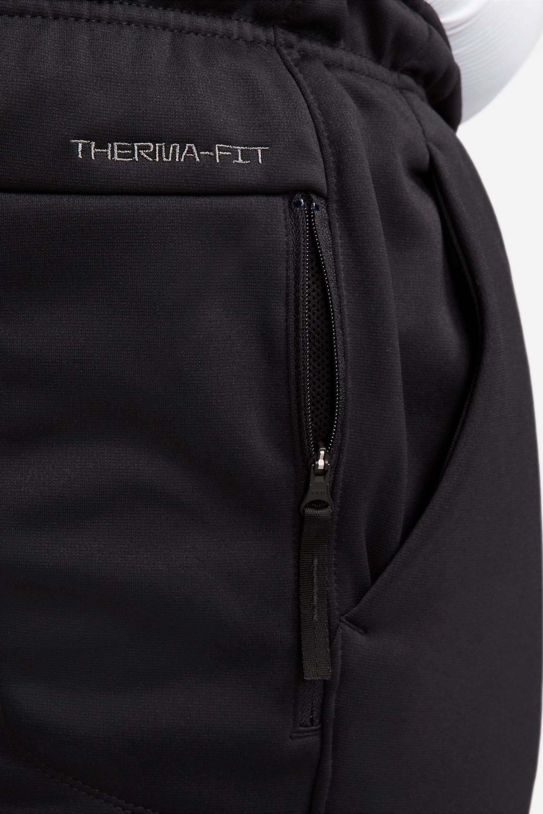 Nike training therma tapered swoosh joggers in black best sale