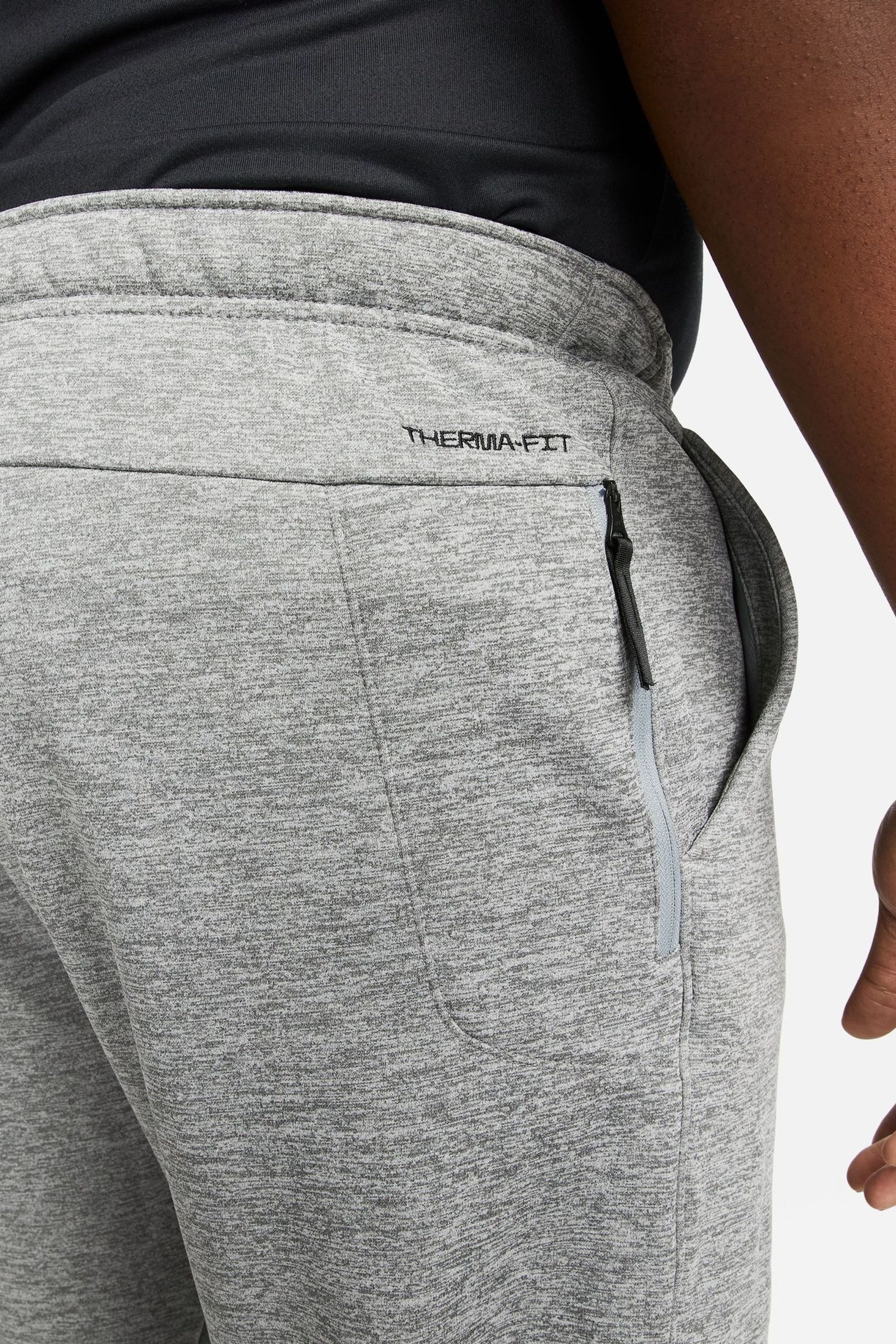 Buy Nike Dark Grey Therma FIT Training Joggers from the Next UK online shop
