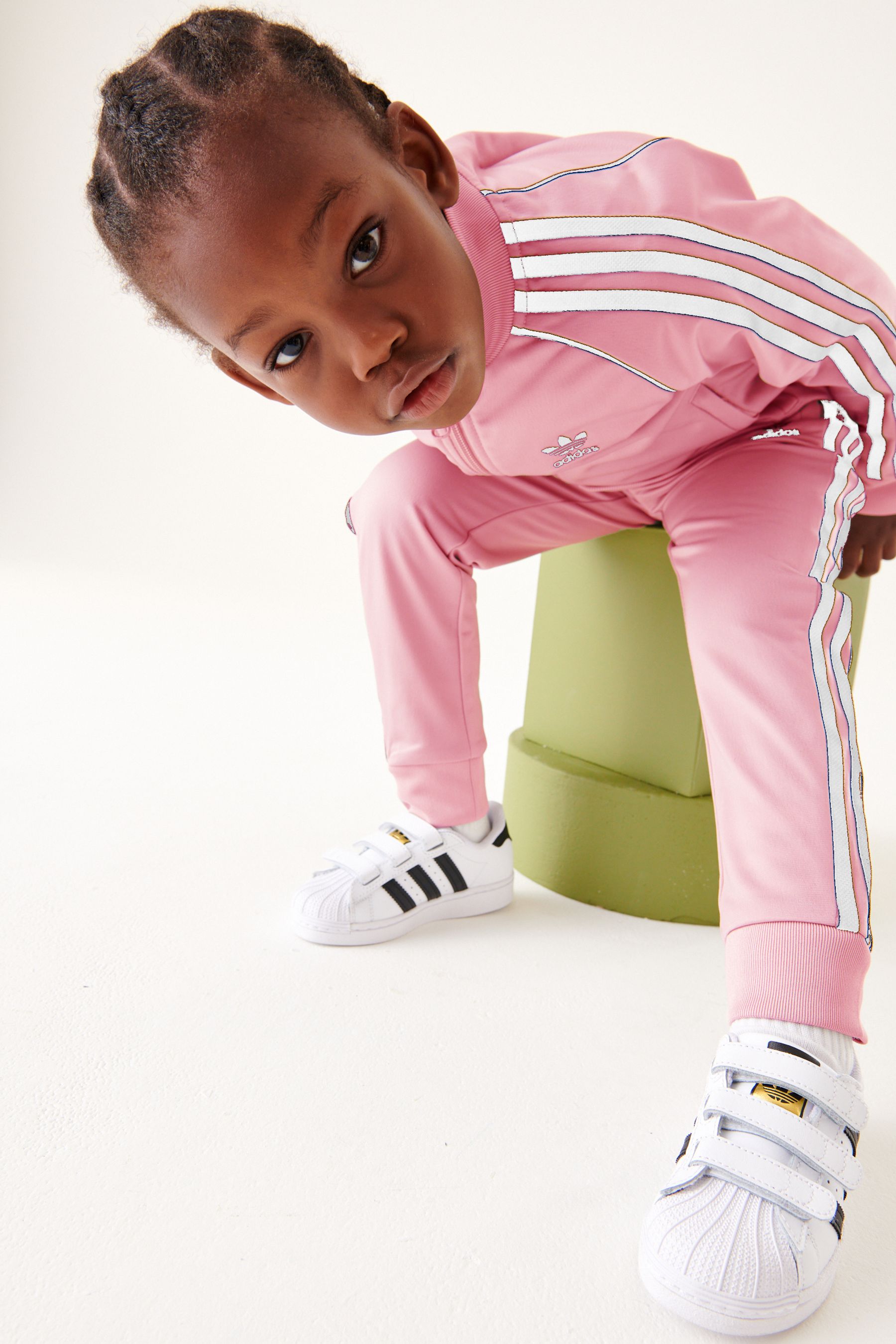 Kids adidas tracksuit pink shop