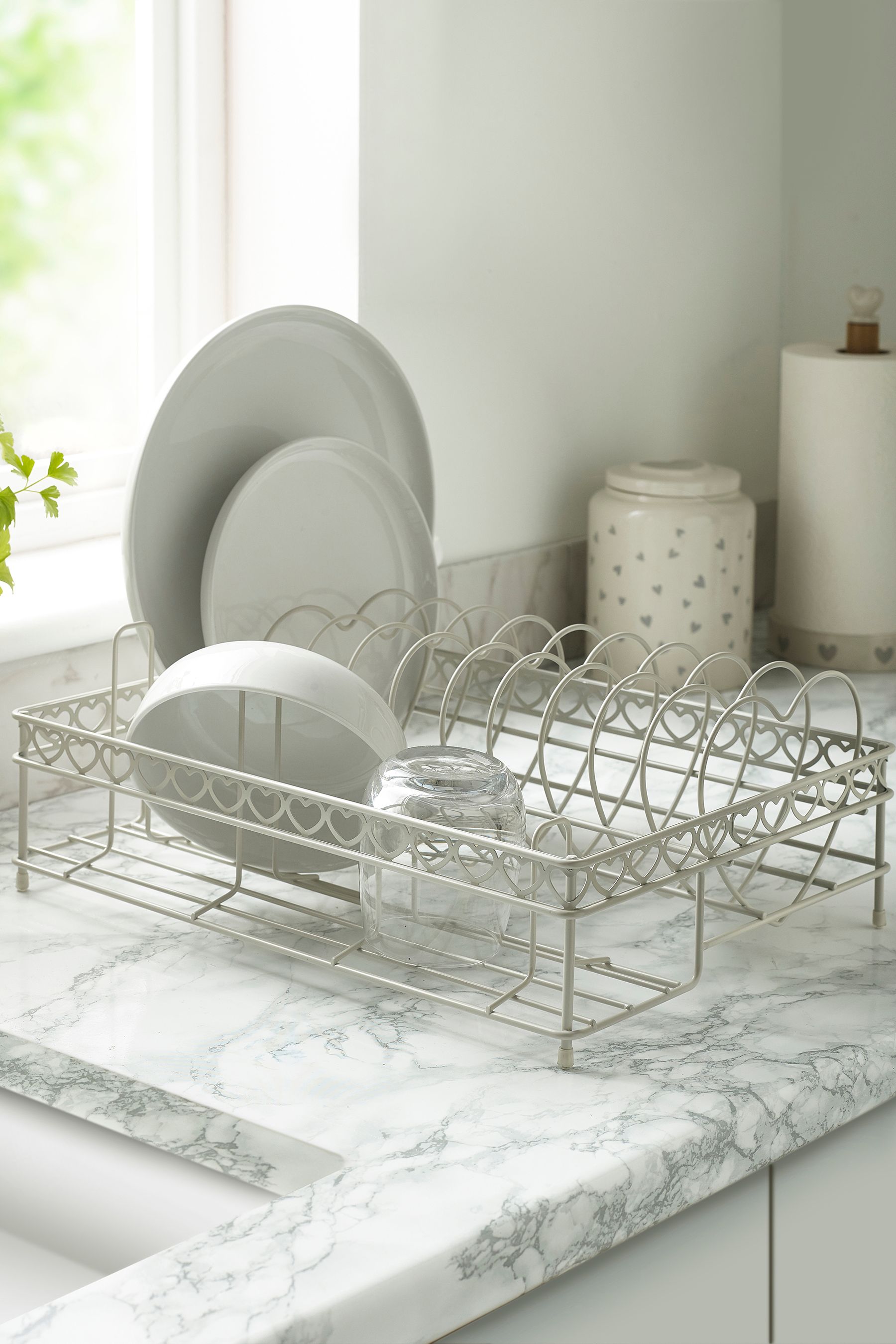Cream metal dish drainer outlet