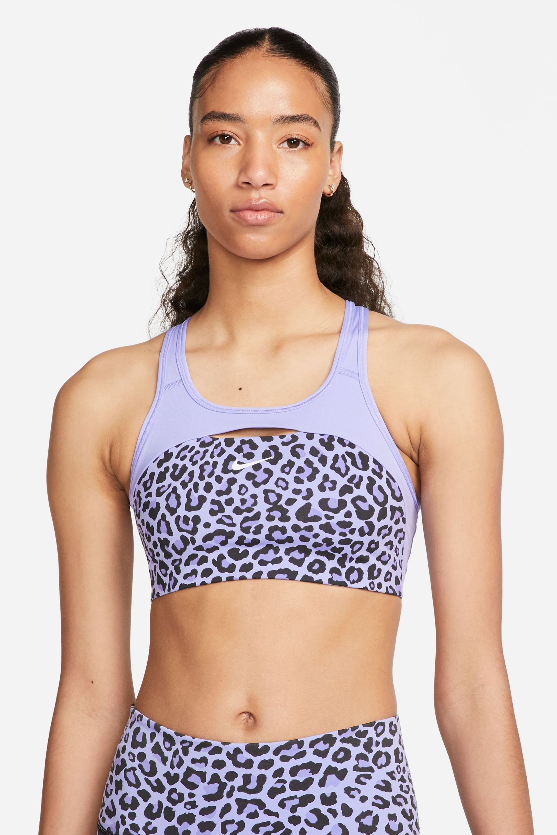 Buy Nike Lilac Dri FIT Swoosh Leopard Medium Support Non Padded Sports Bra from Next Ireland
