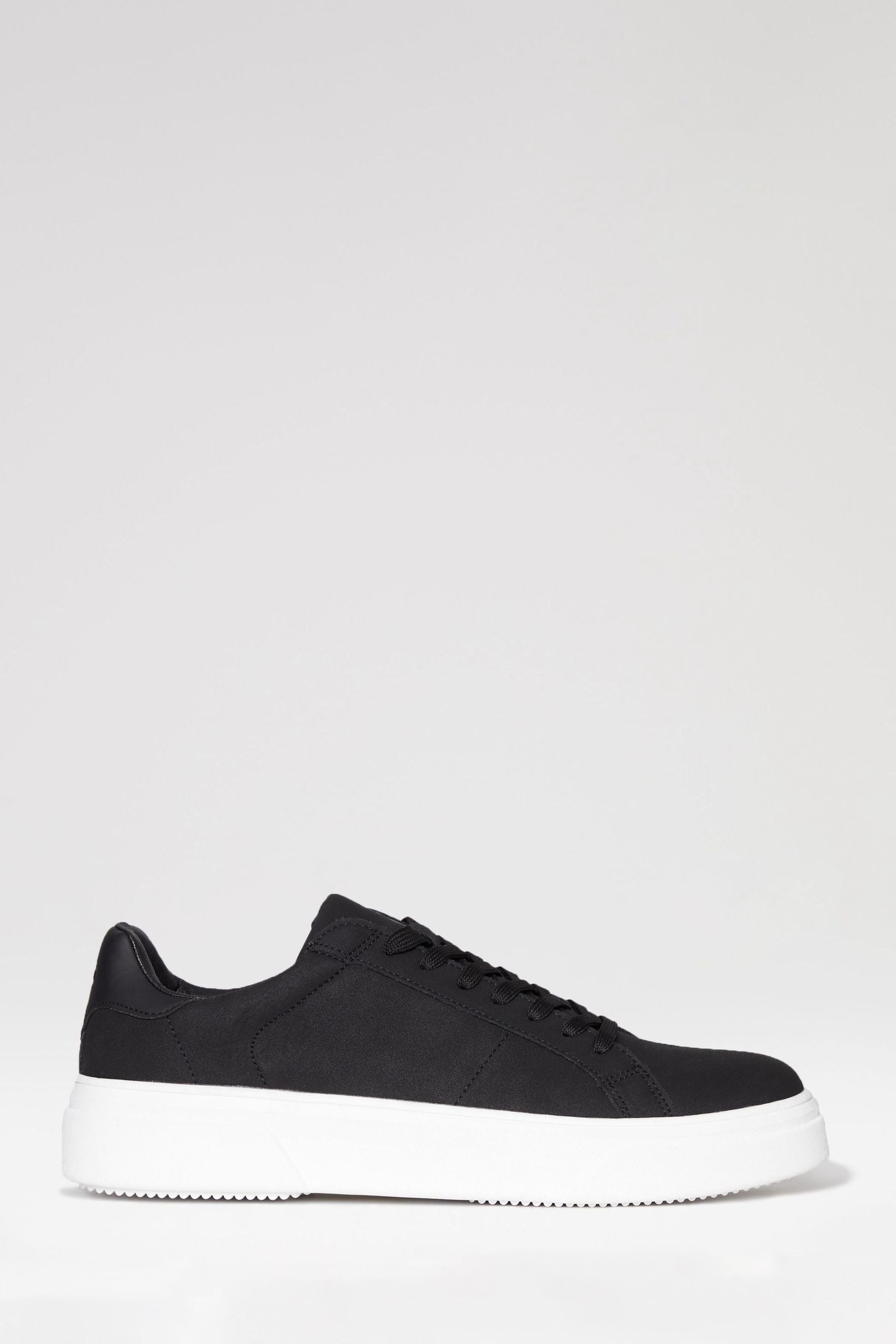 Raised sole trainers deals