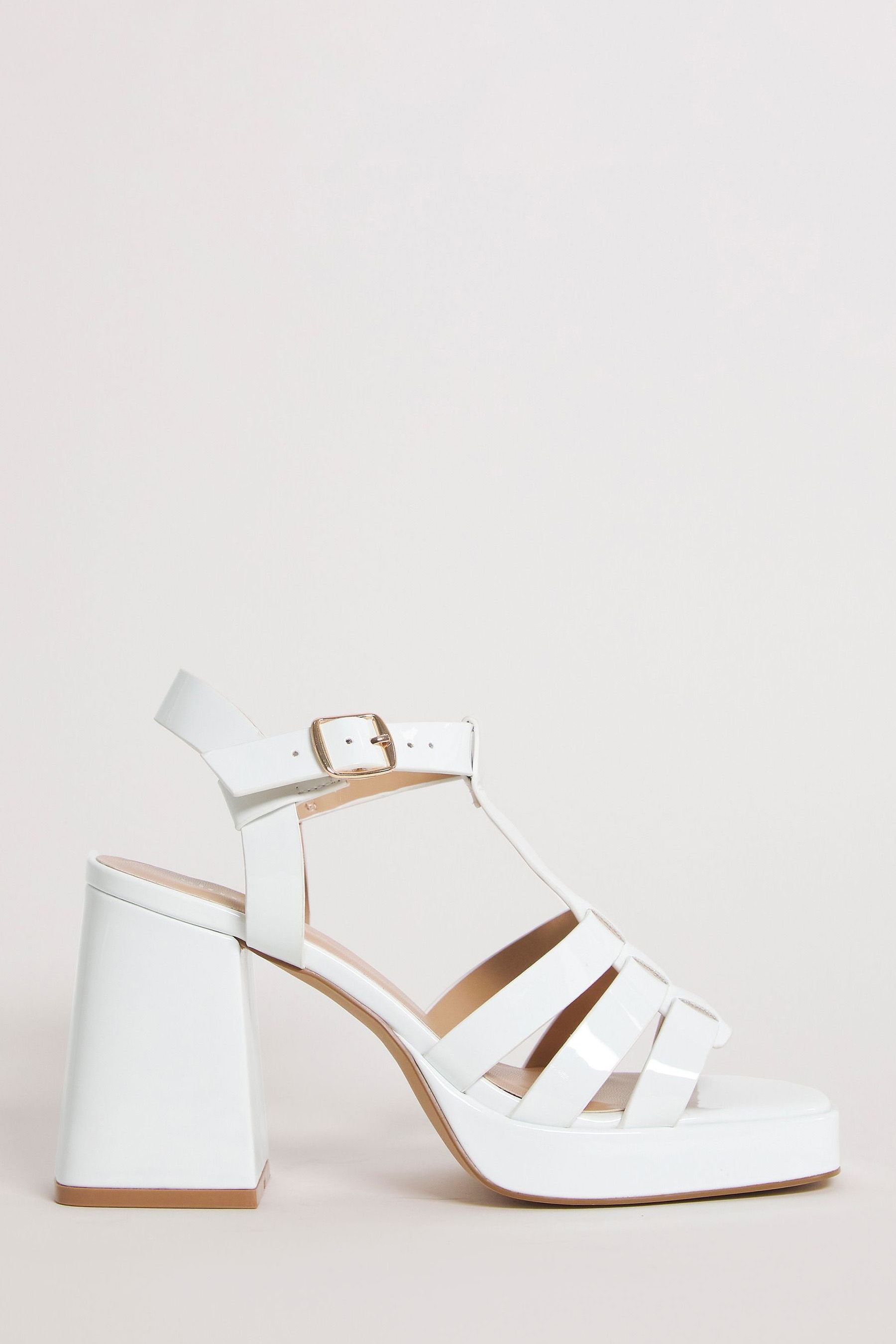 Wide fit caged heels cheap