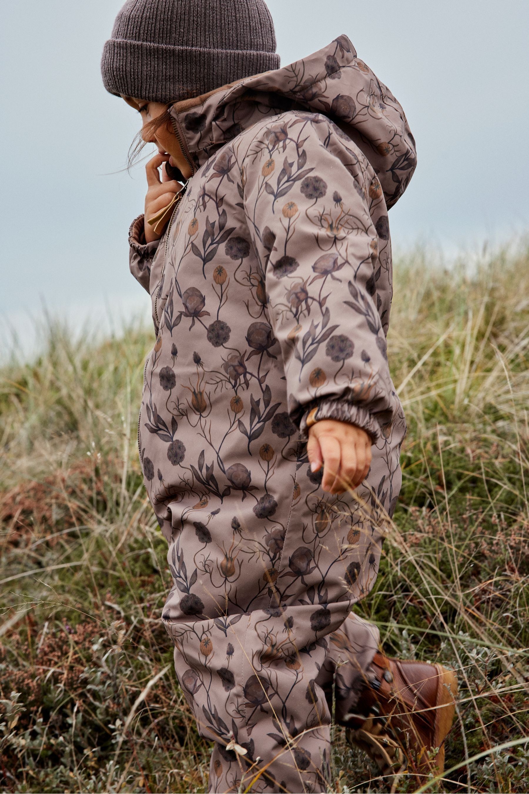 Buy Lil Atelier Unisex Dark Brown Floral Print One Piece Hooded Zip Snowsuit from Next Luxembourg