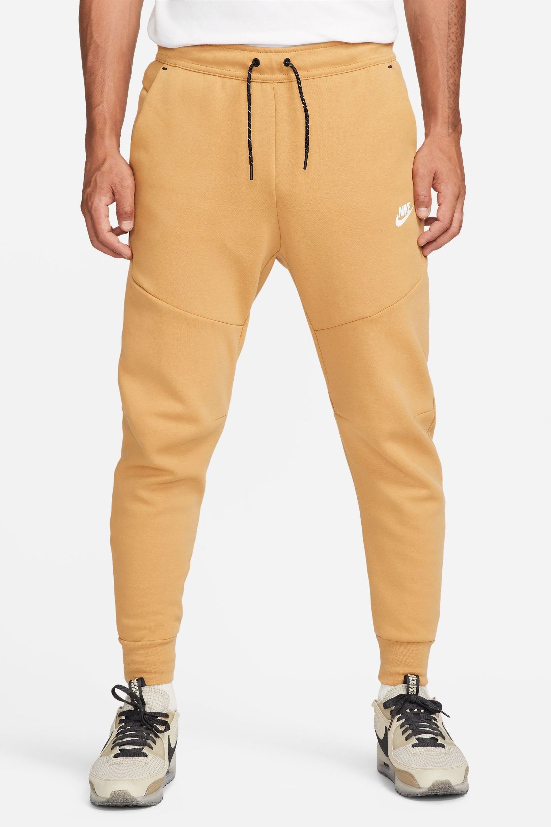 Buy Nike Yellow Tech Fleece Joggers from Next Lithuania