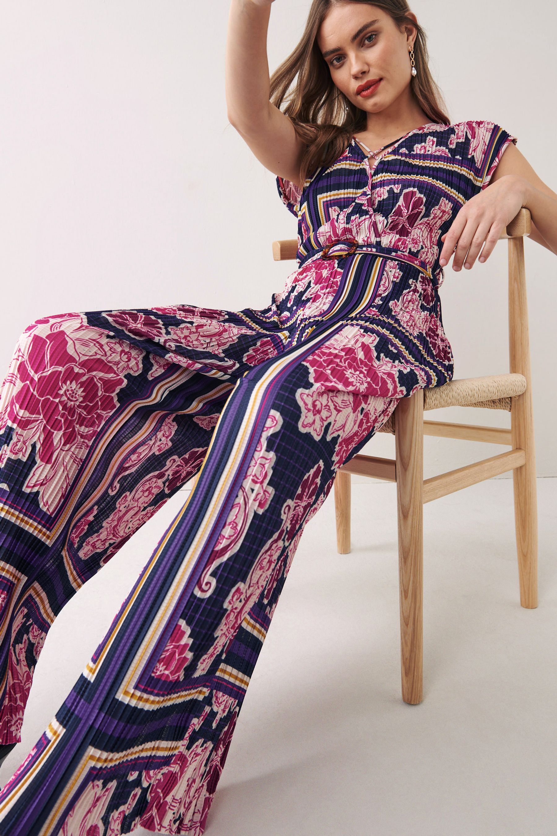 Buy Navy Blue Pink Printed Plisse Belted Jumpsuit from Next Slovenia