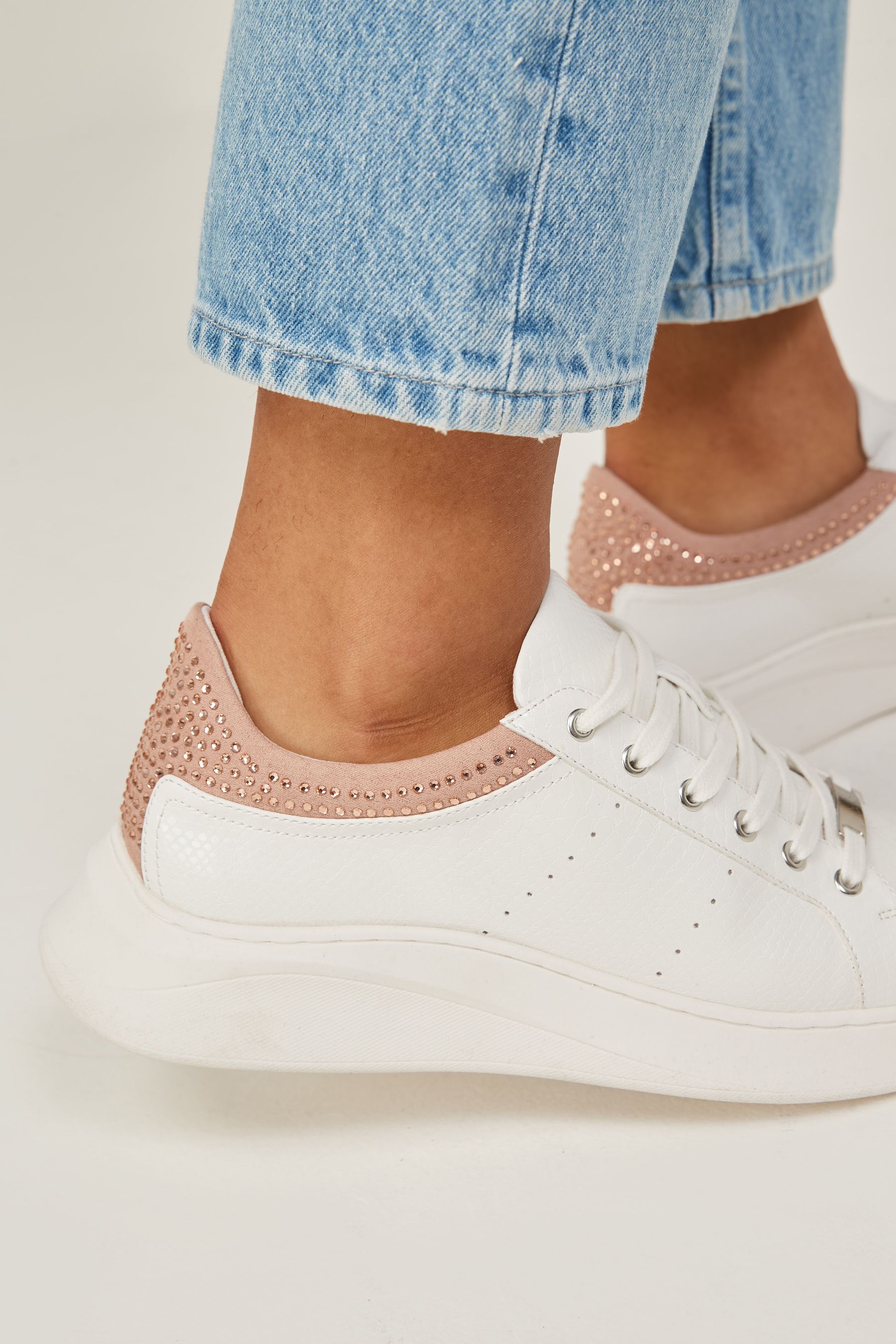 White trainers with pink back hotsell