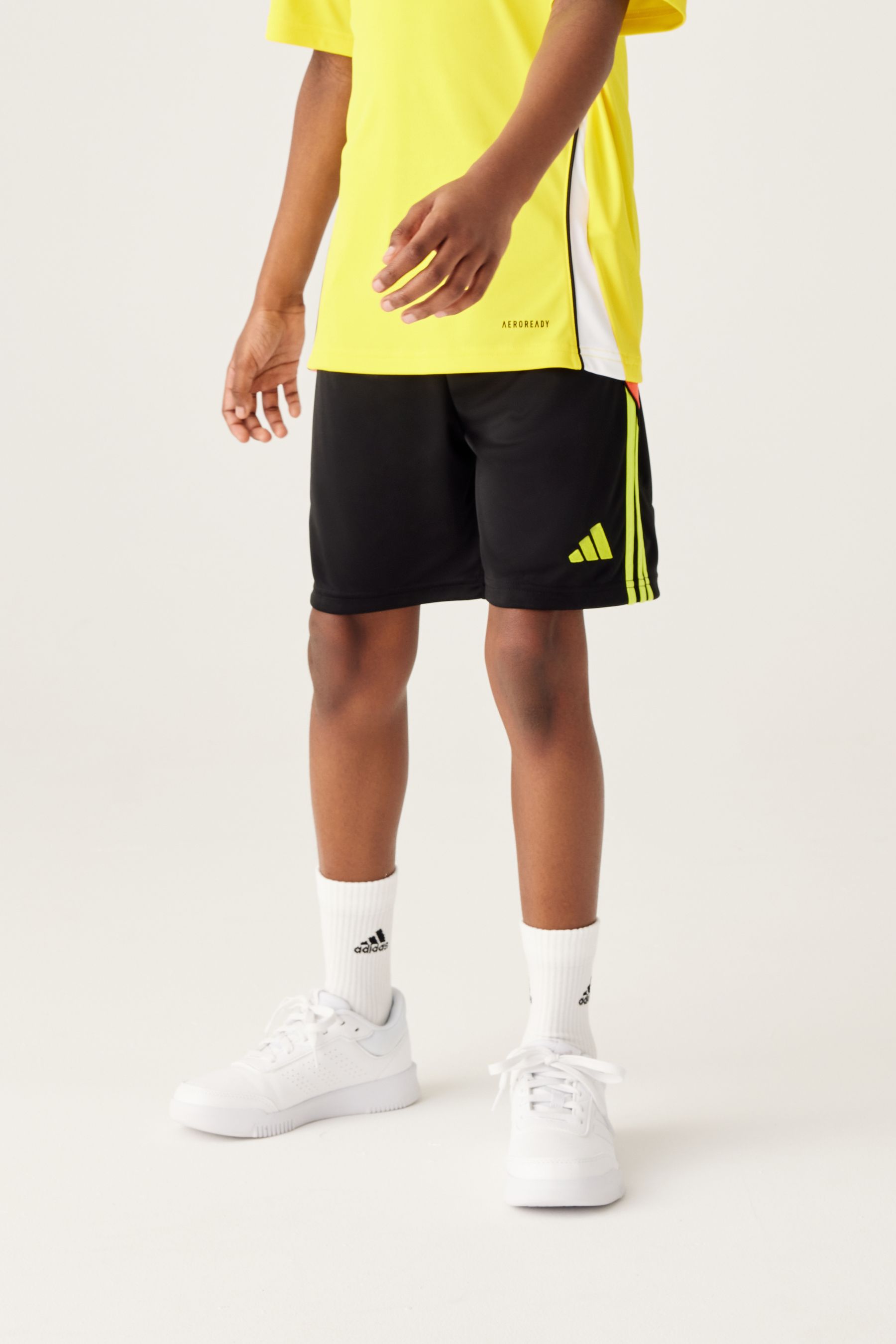 Adidas black shorts with yellow stripes sales