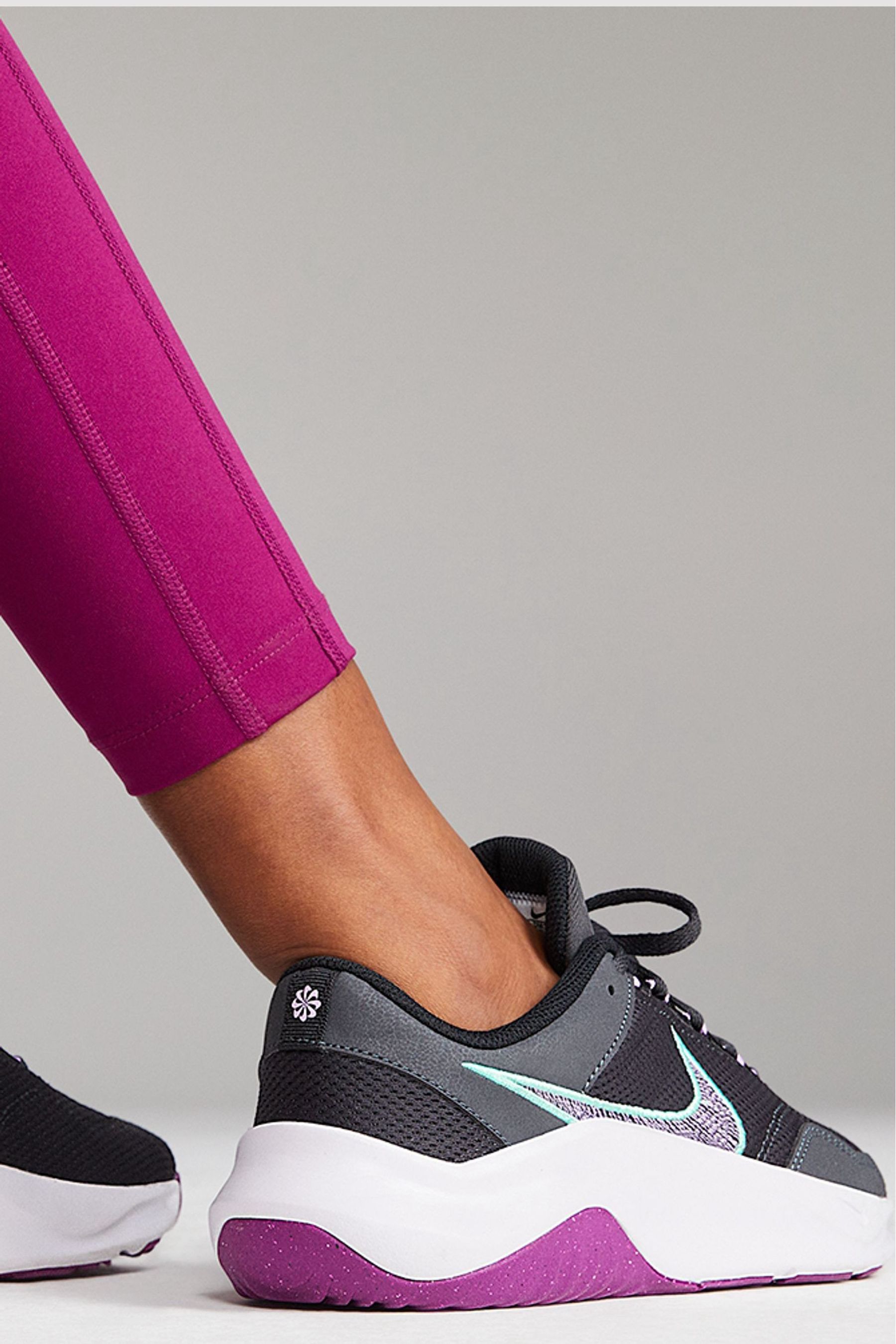 Nike training legend trainers in triple black sale