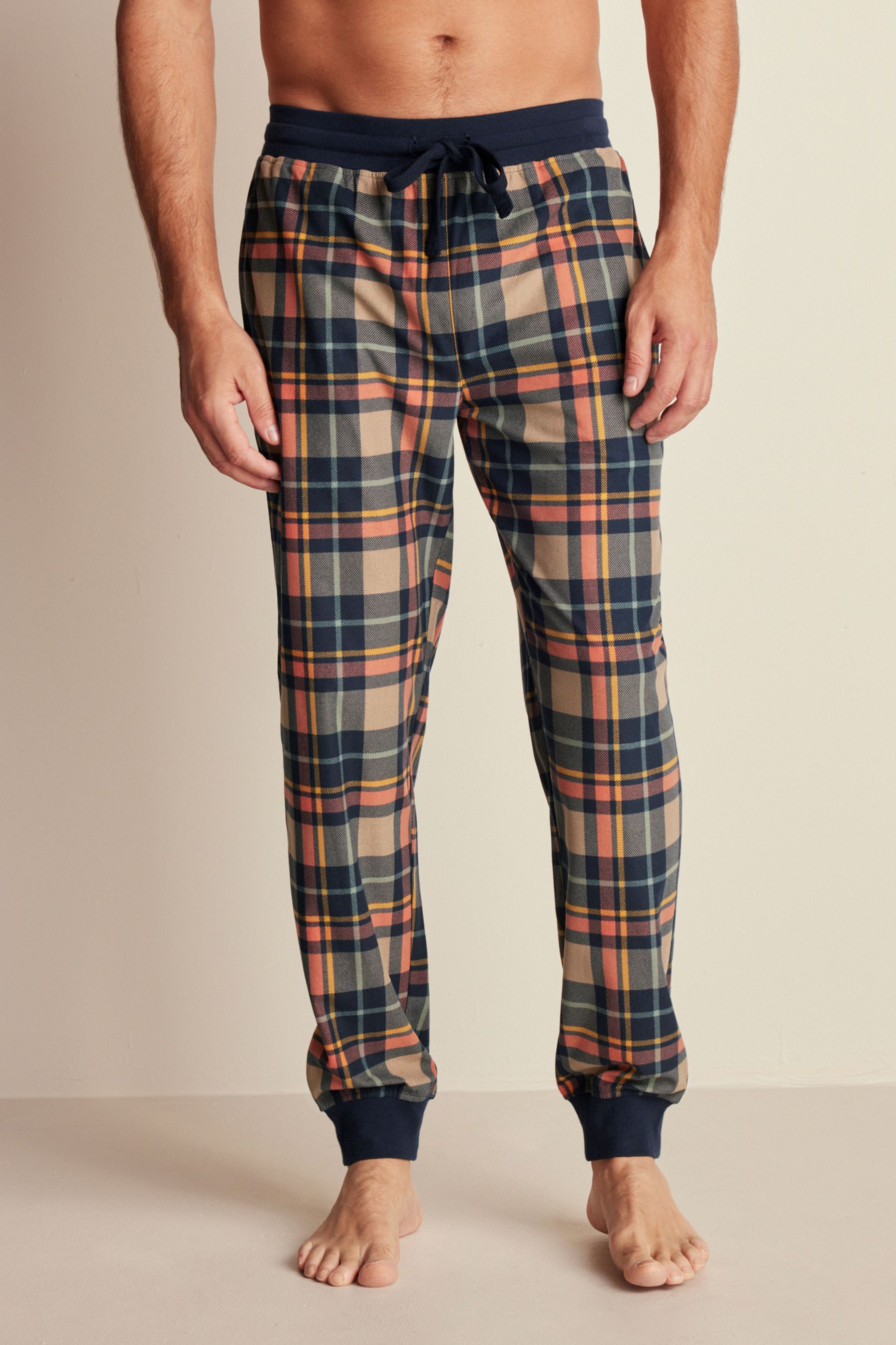 Buy Navy Blue Neutral Check Motion Flex Cosy Cuffed Pyjama Bottoms from Next Qatar