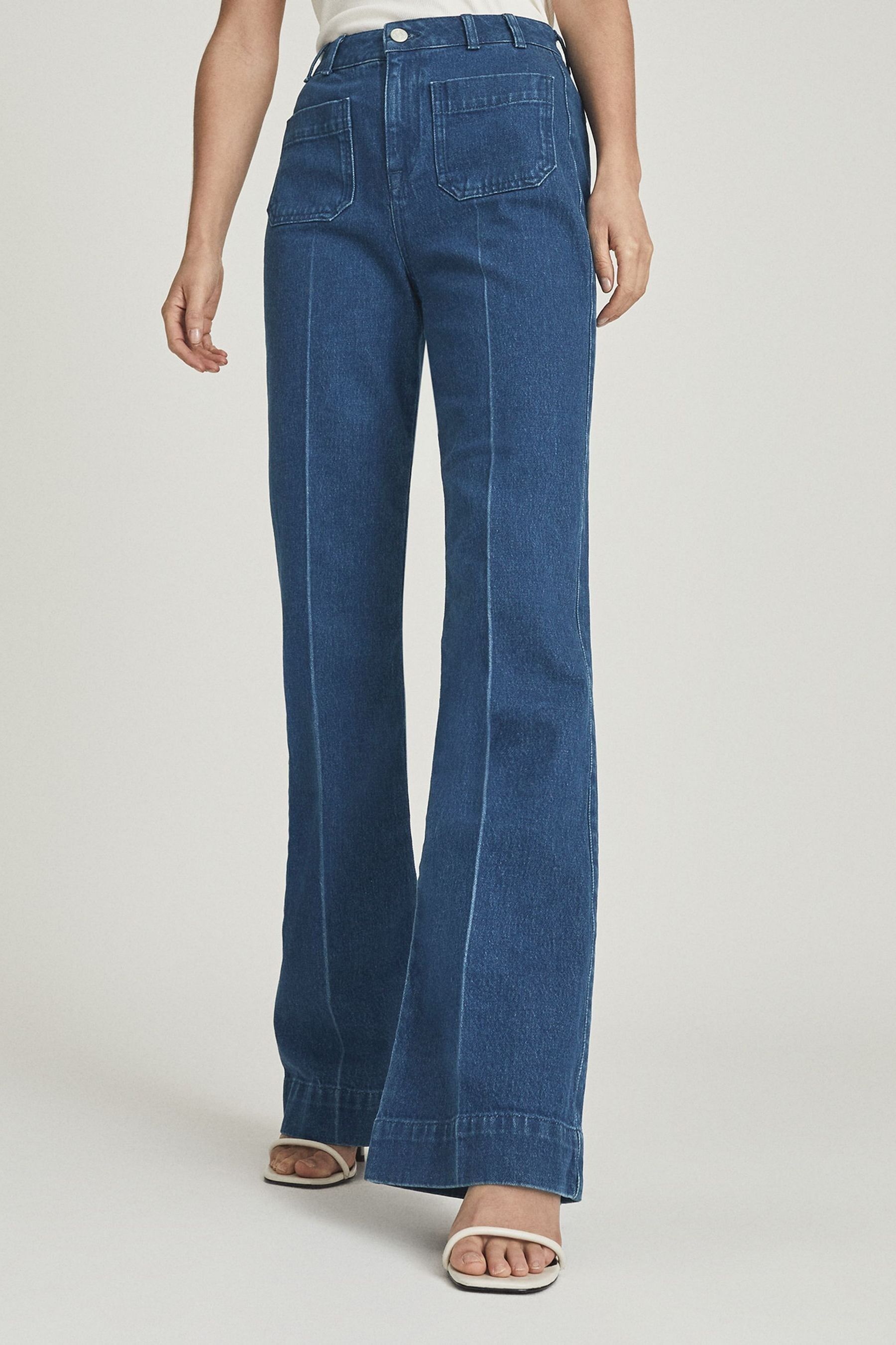 Buy Reiss Mid Blue Isa High Rise Flared Jeans from Next Australia