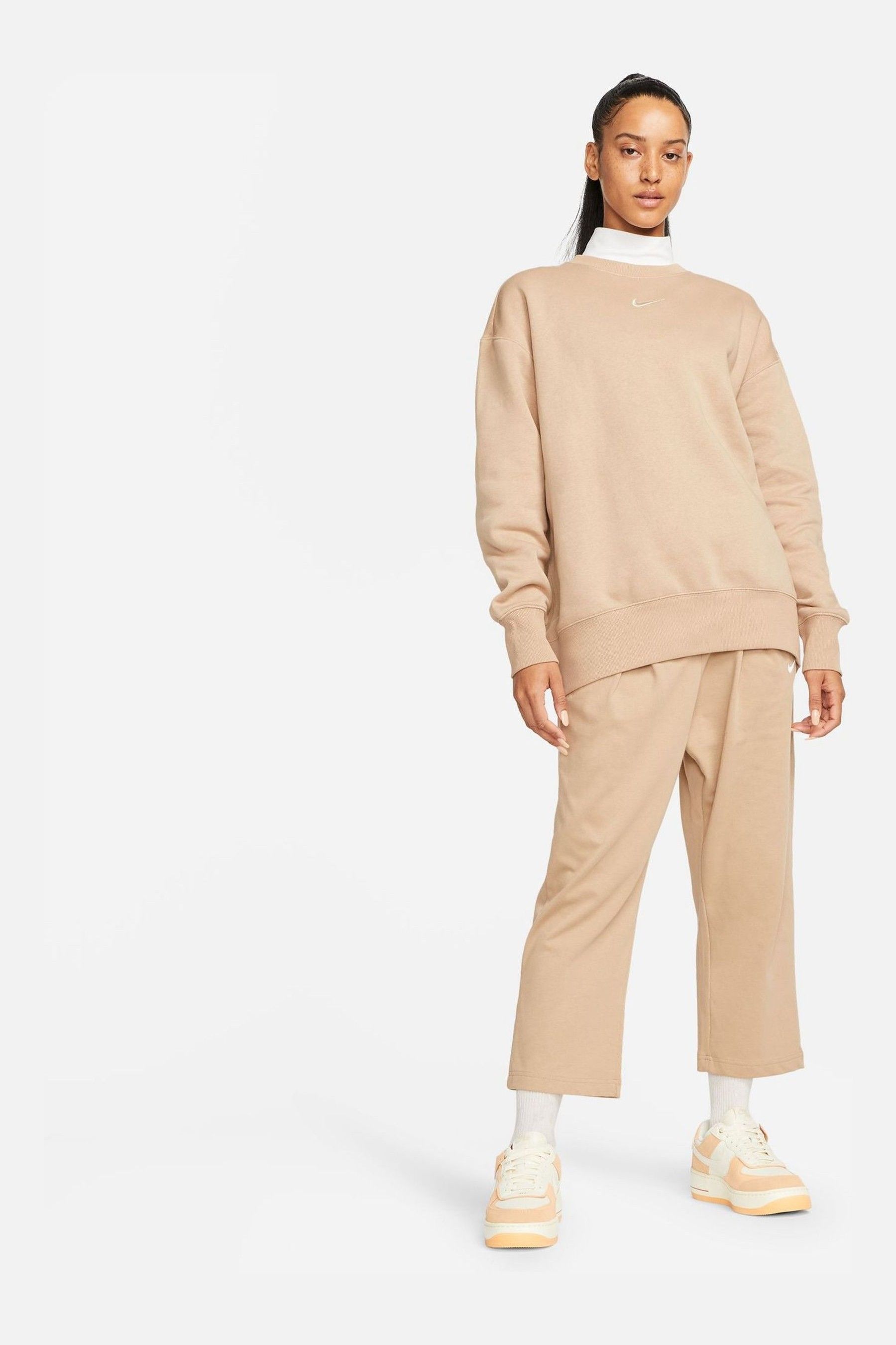 Buy Nike Beige Oversized Mini Swoosh Sweatshirt from Next Germany