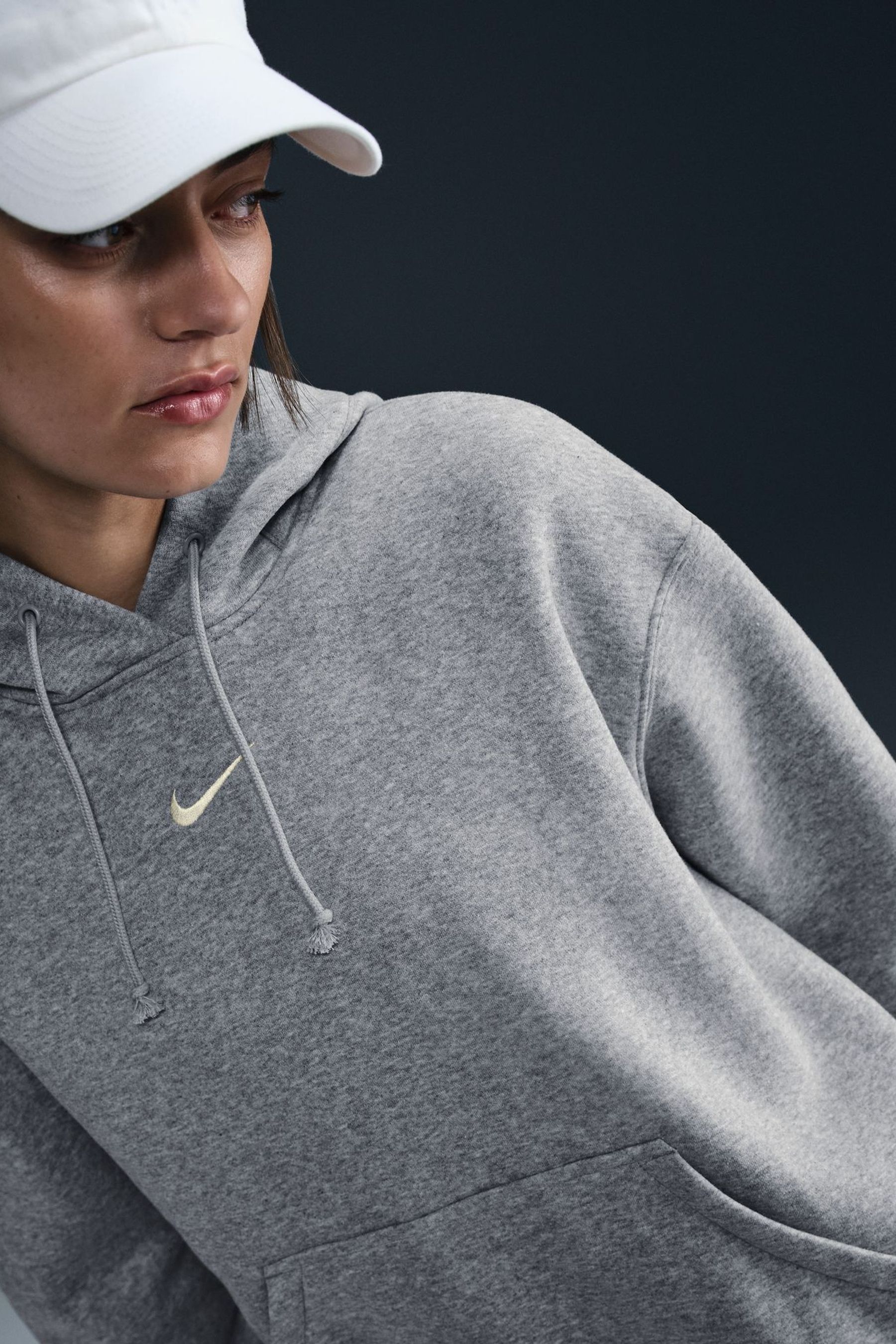 Buy Nike Dark Grey Heather Sportswear Phoenix Fleece Oversized Mini Swoosh Pullover Hoodie from the Next UK online shop