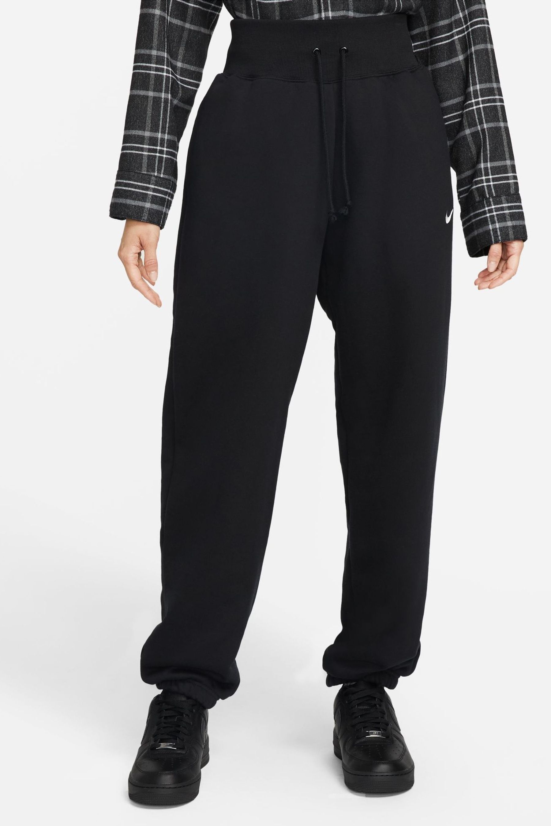 Buy Nike Black Oversized Mini Swoosh Joggers from the Next UK online shop