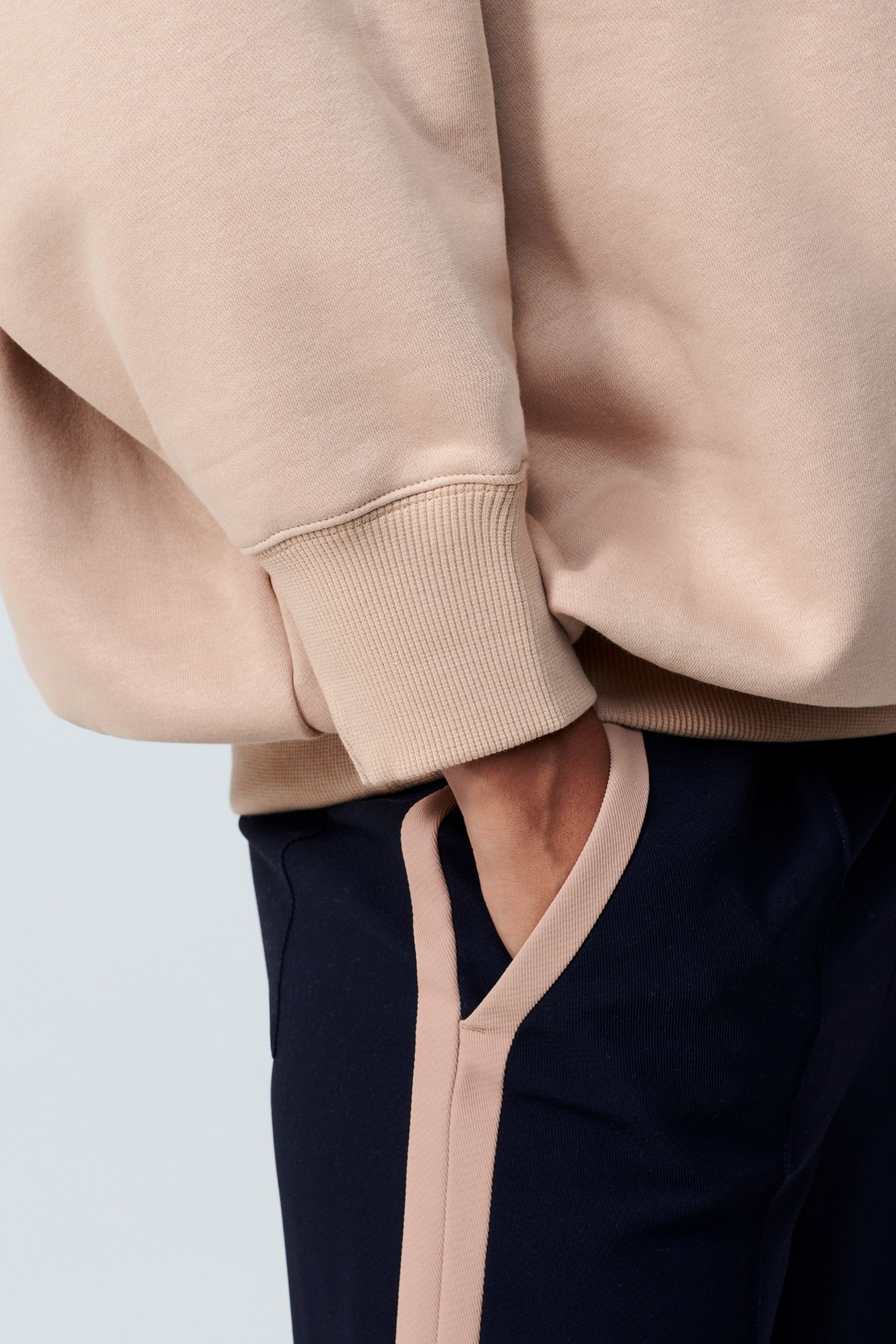 Nike mini swoosh oversized cropped light beige sweatshirt top