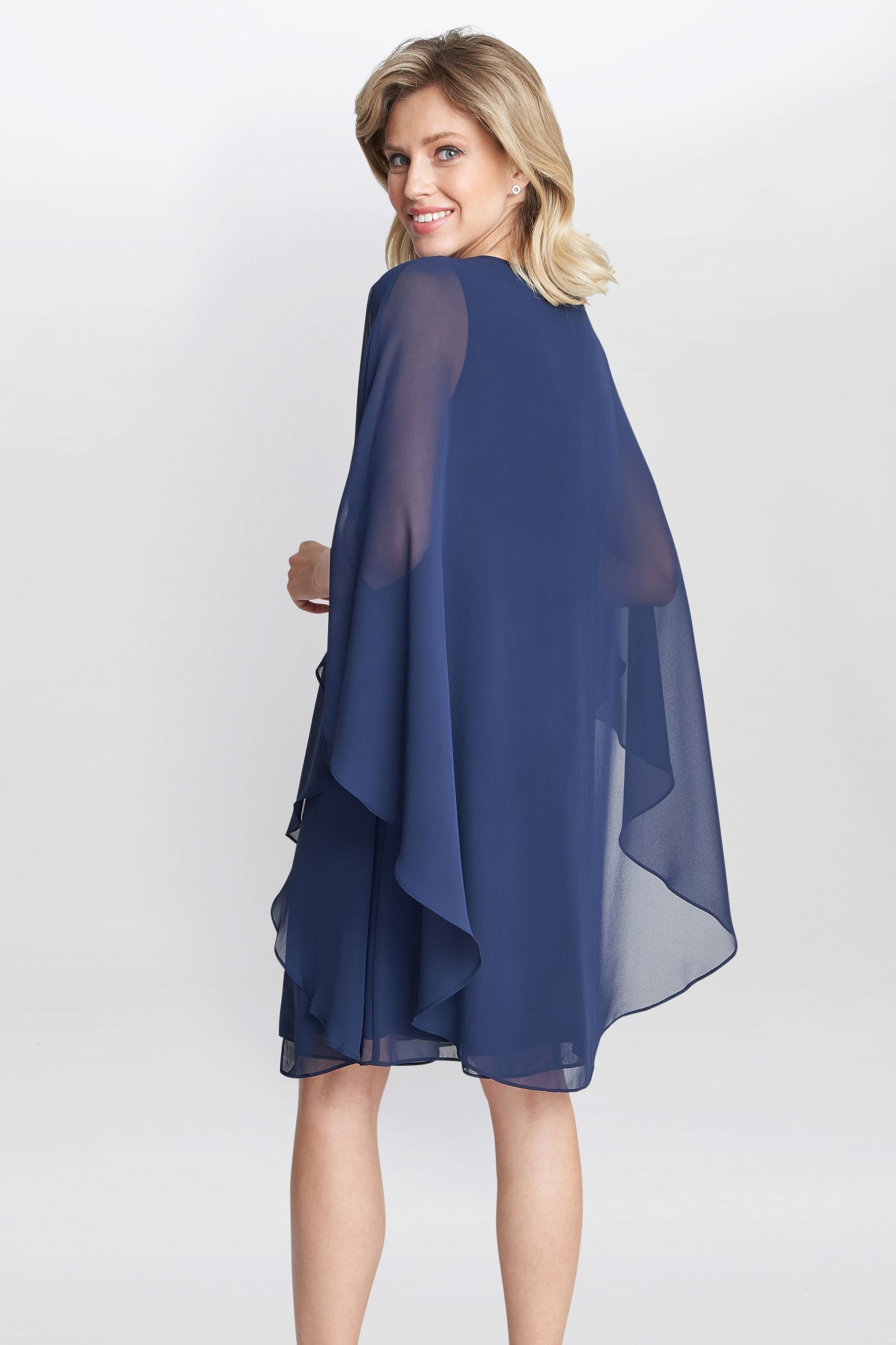 Buy Gina Bacconi Blue Laura Chiffon Cape And Beaded Neck Dress from Next Luxembourg